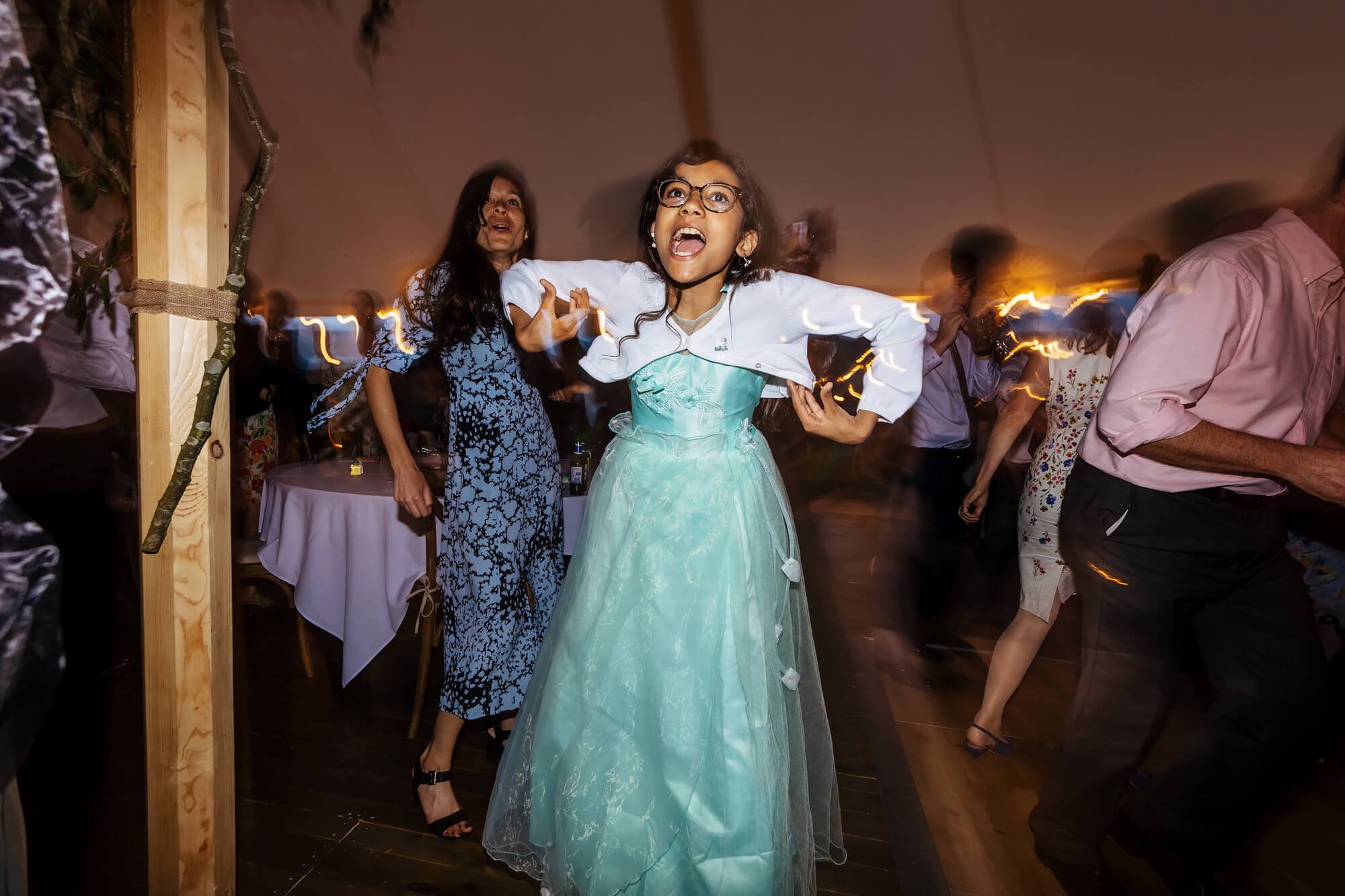 Young girl on the dance floor at a Cumbria wedding