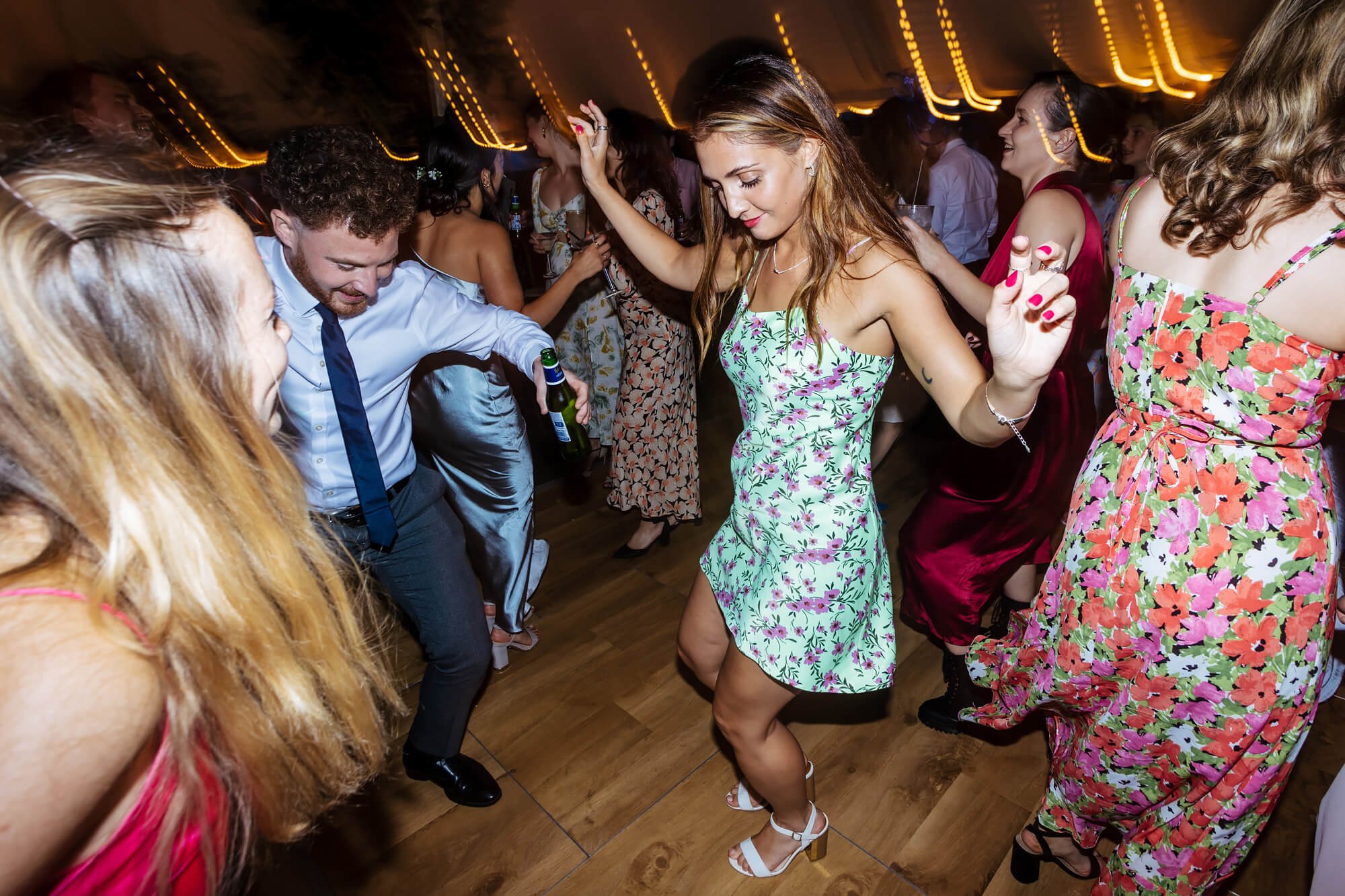 Wedding guests dancing in Cumbria