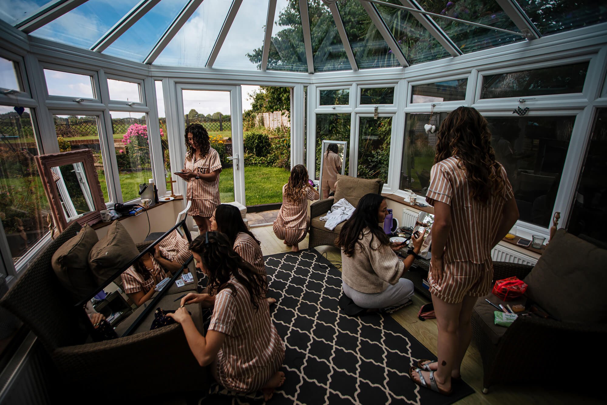 Girls doing their makeup for a wedding