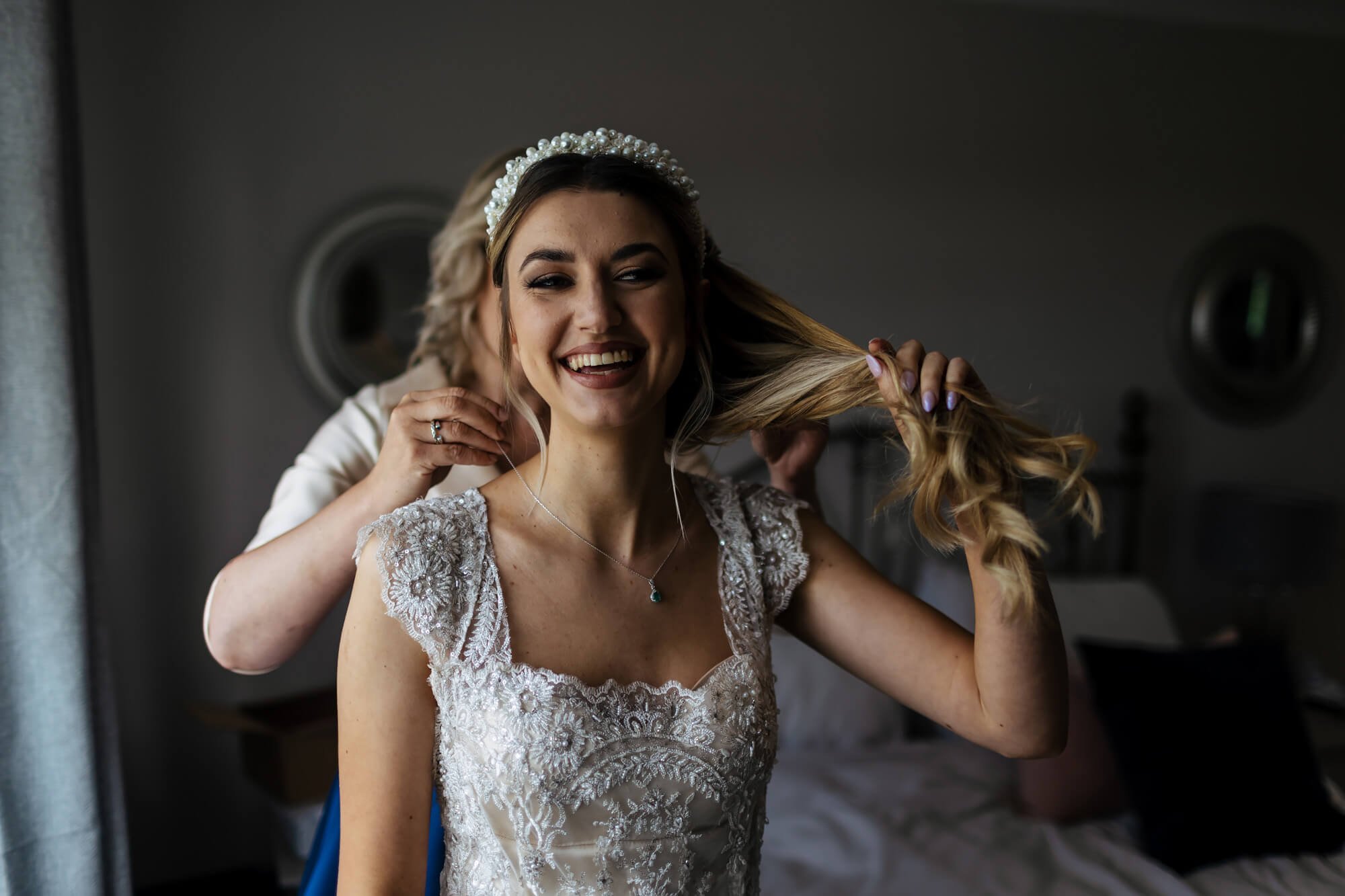 Bride laughing in her wedding dress