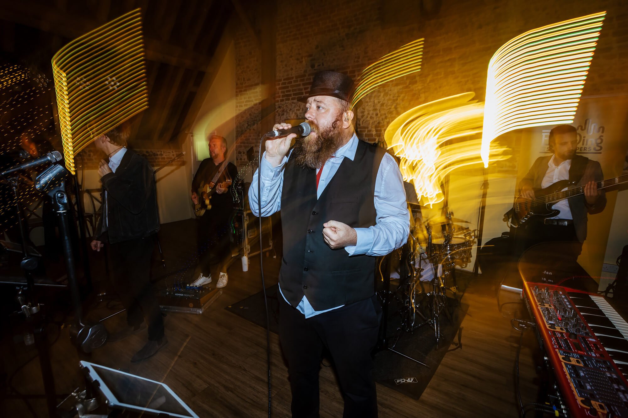 Singer in a band at the wedding at Barford Park Barn