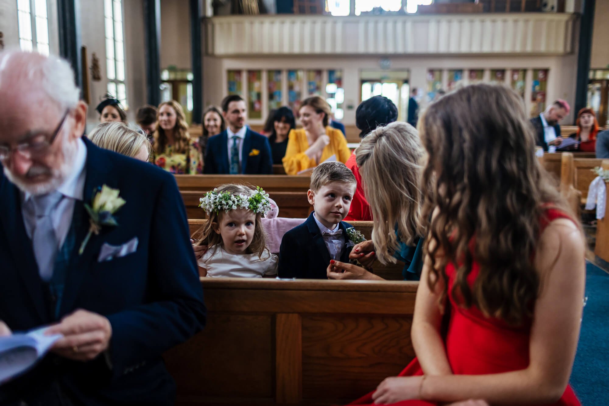 Young children at a church wedding