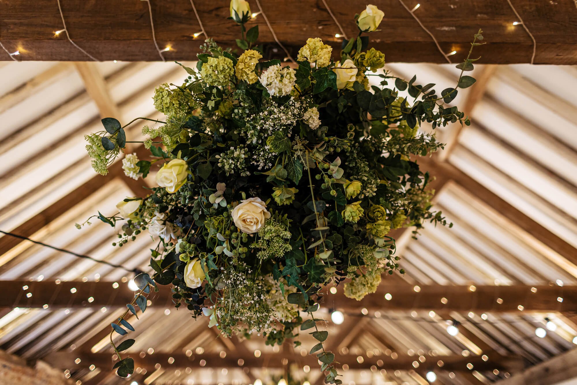 Wedding flowers hanging from the ceiling