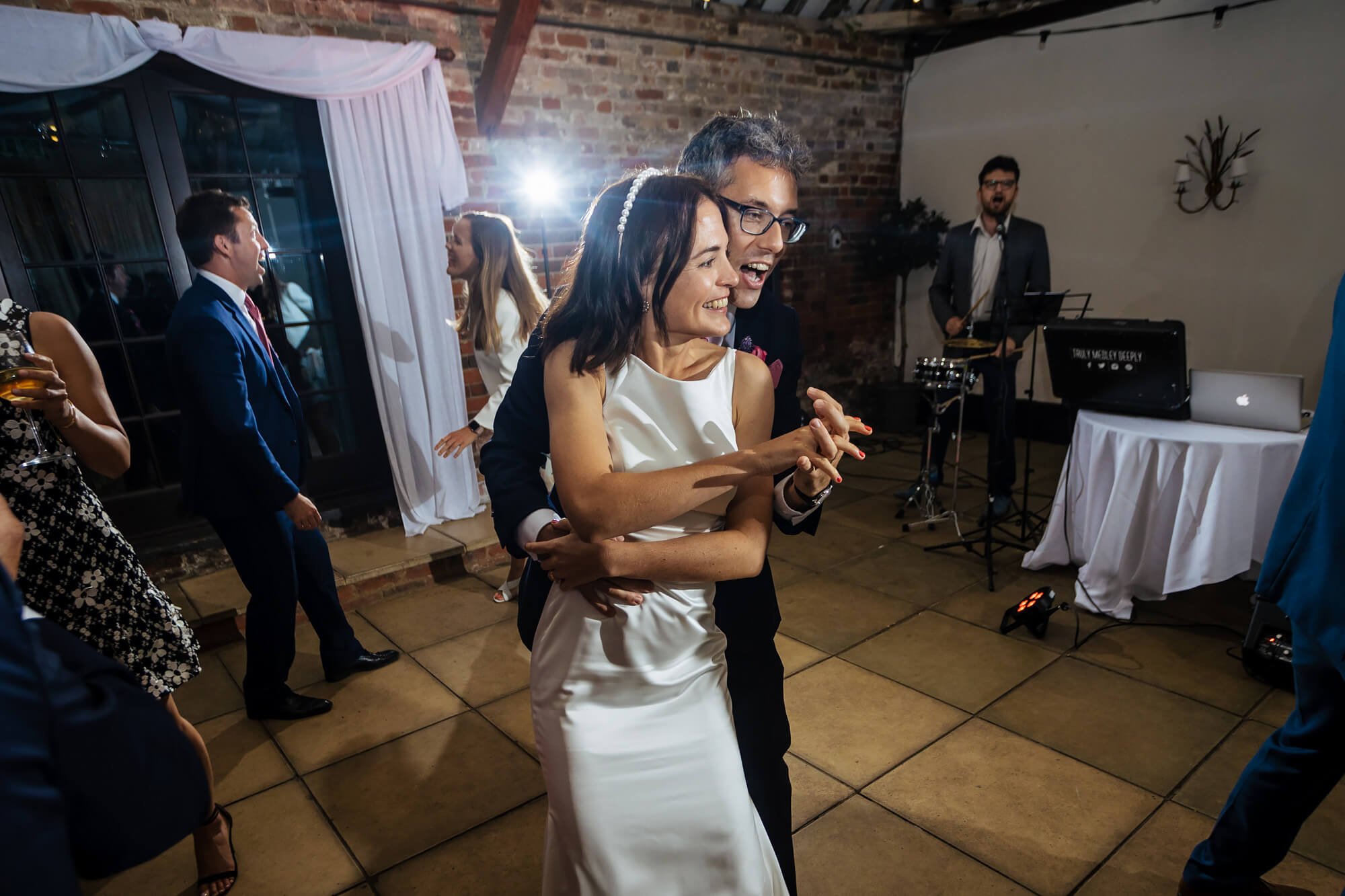 Bride and groom on the dance floor at their wedding