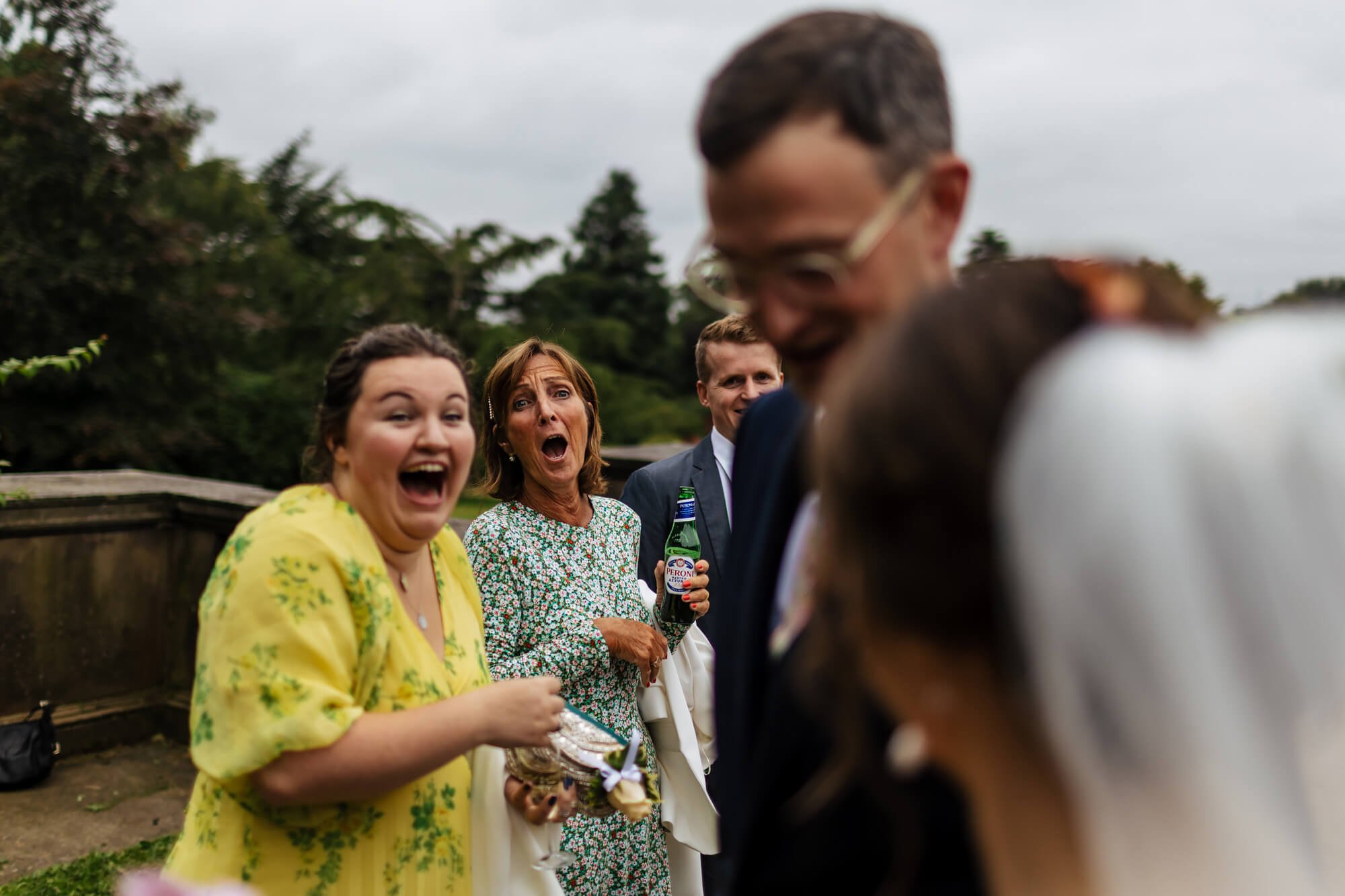 Guests laughing during the reception at a wedding