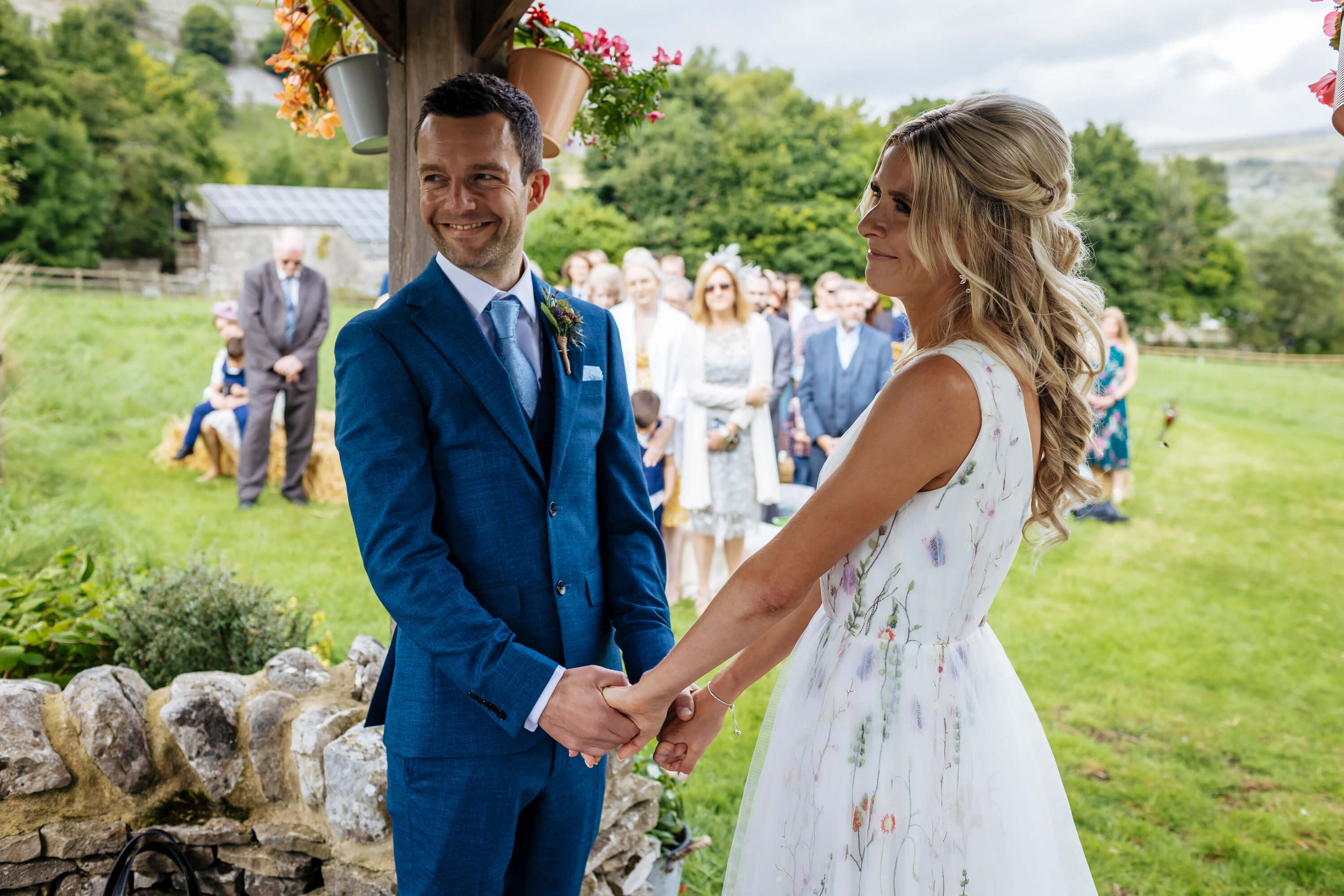 Bride and groom saying I do at their wedding