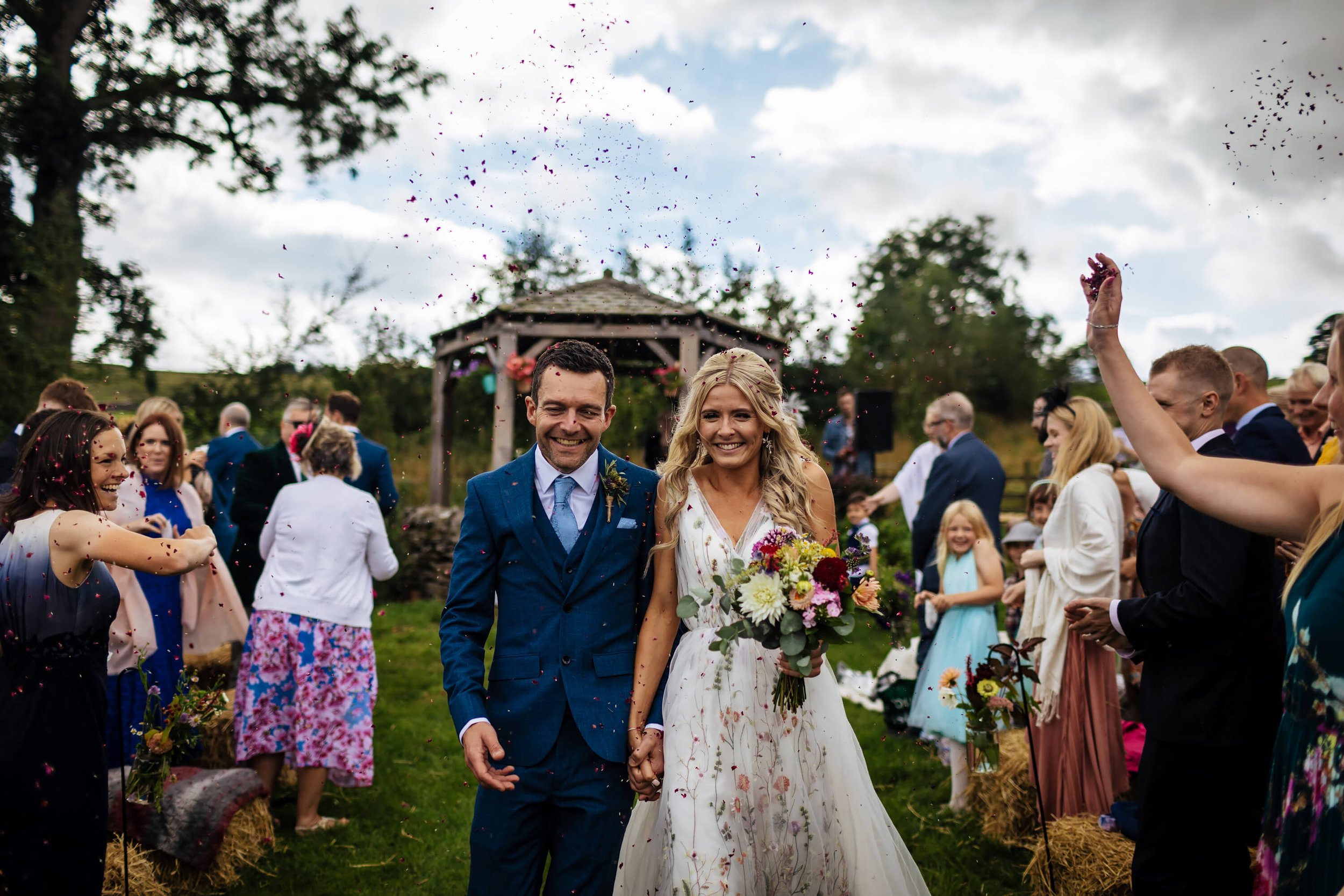 Confetti throw at a Kilnsey Park wedding