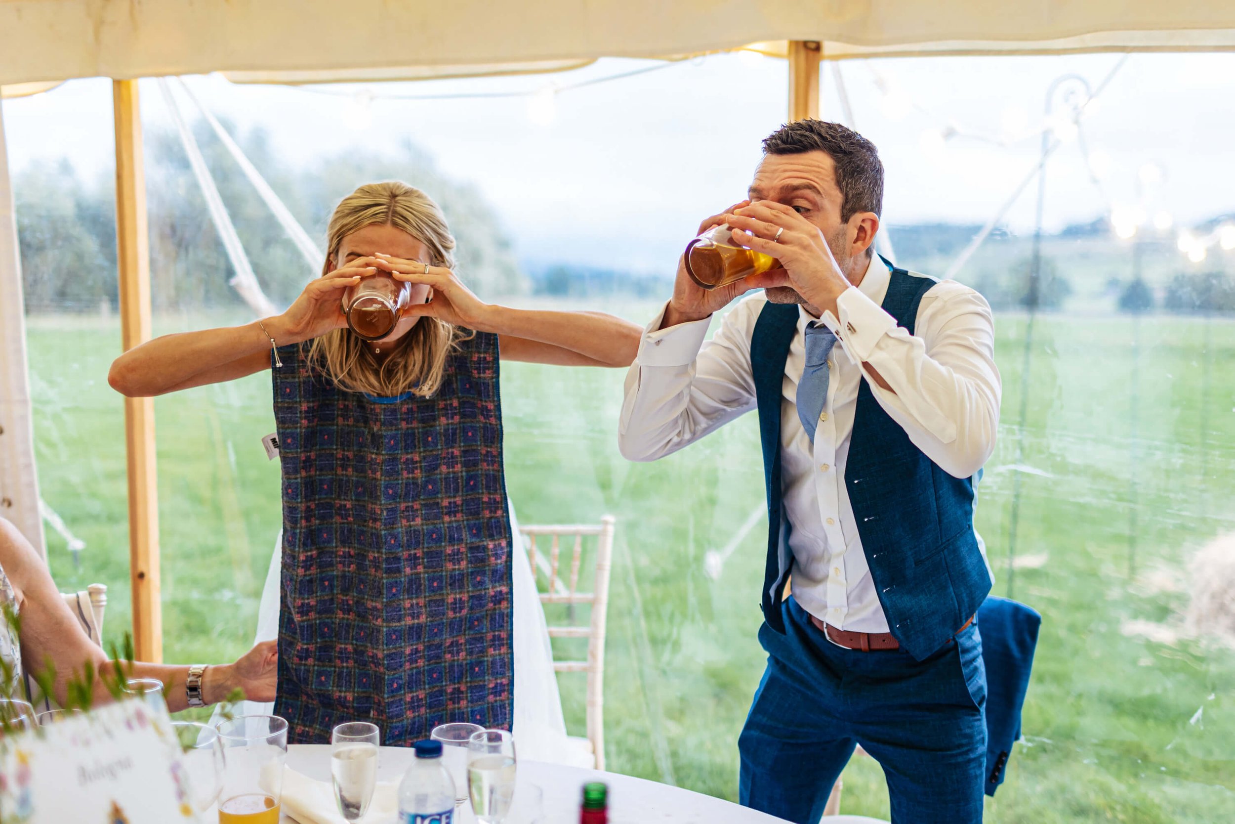 Drinking race between the bride and groom