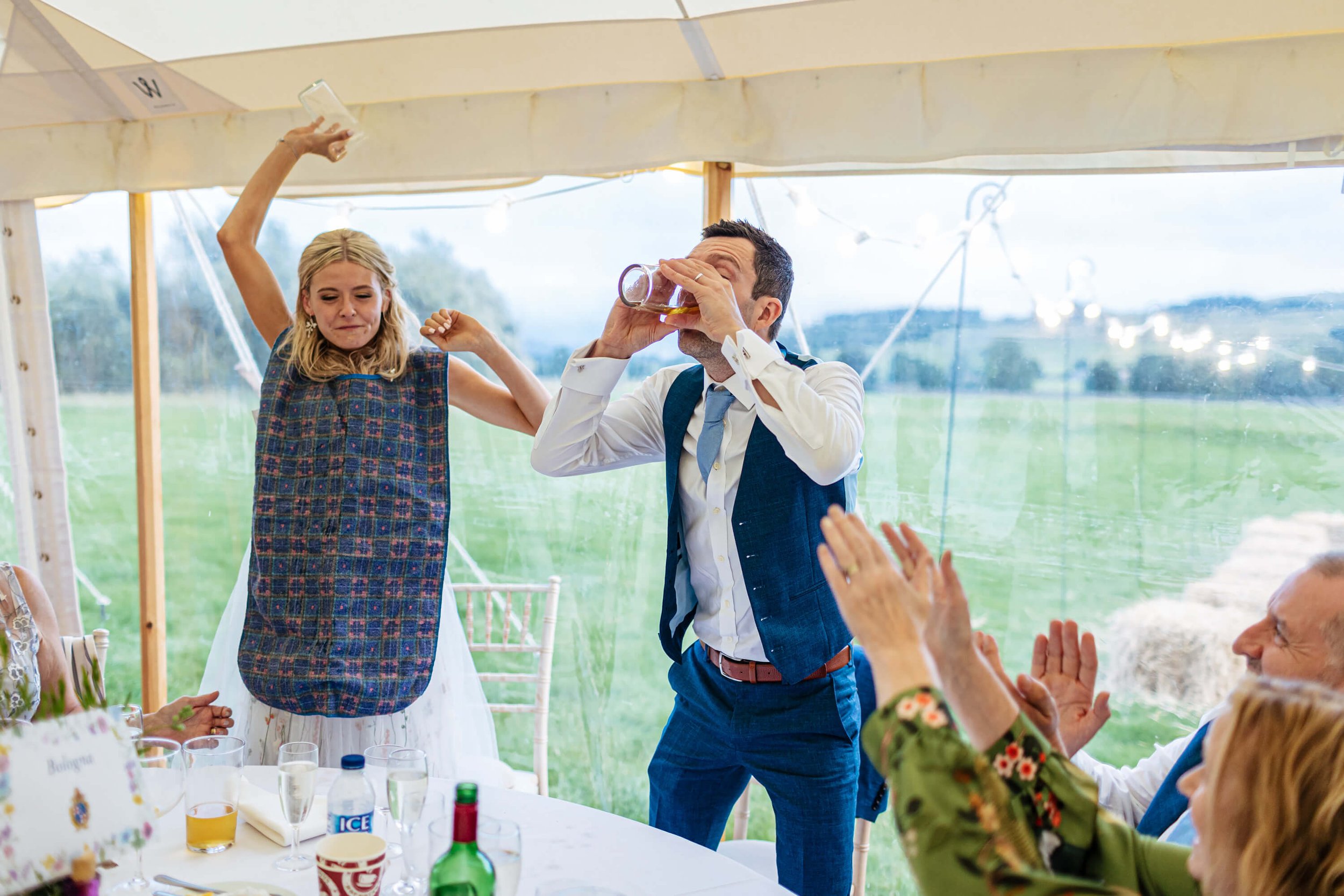 Bride wins the drinking race at her wedding