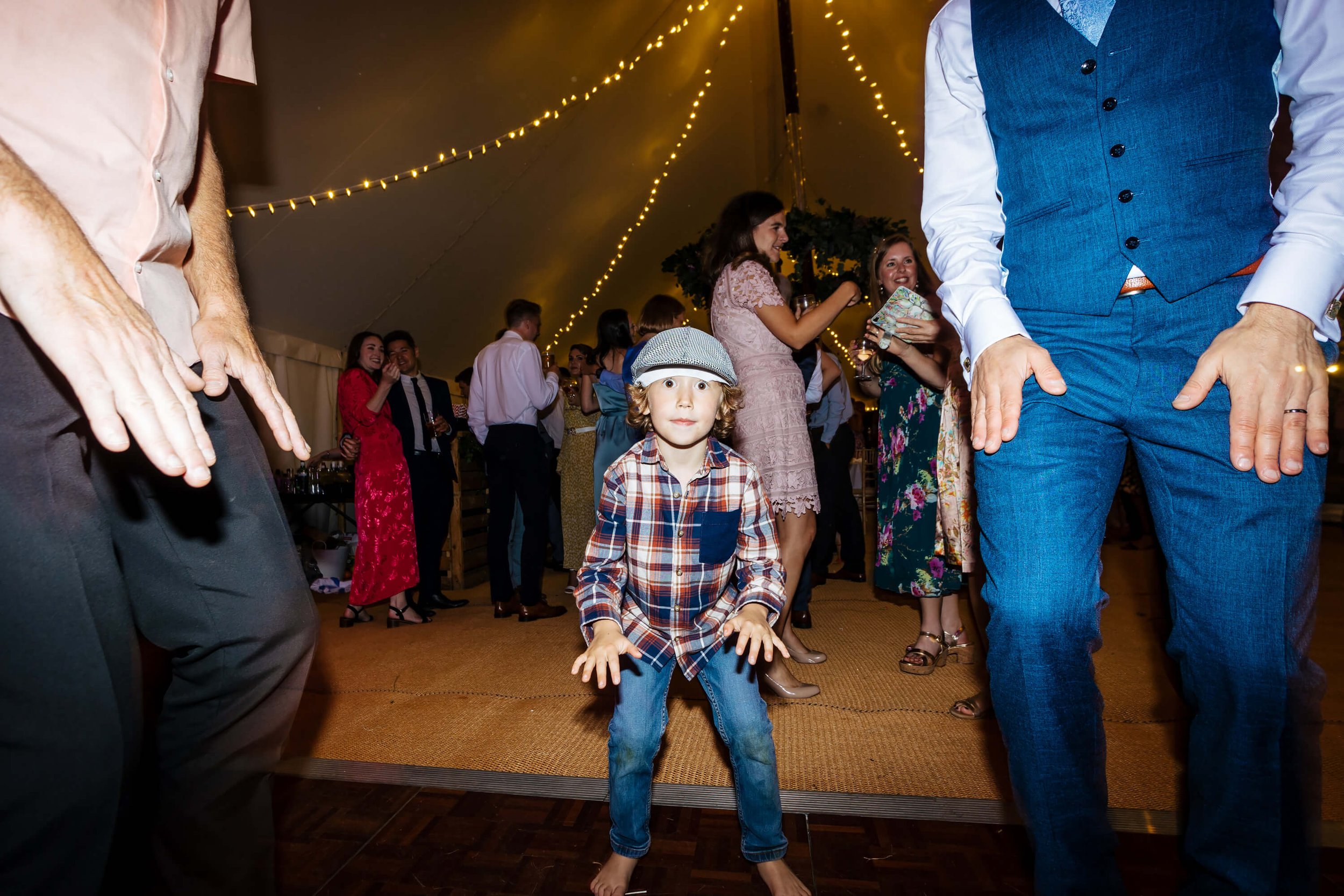 Young boy dancing at a wedding in Yorkshire