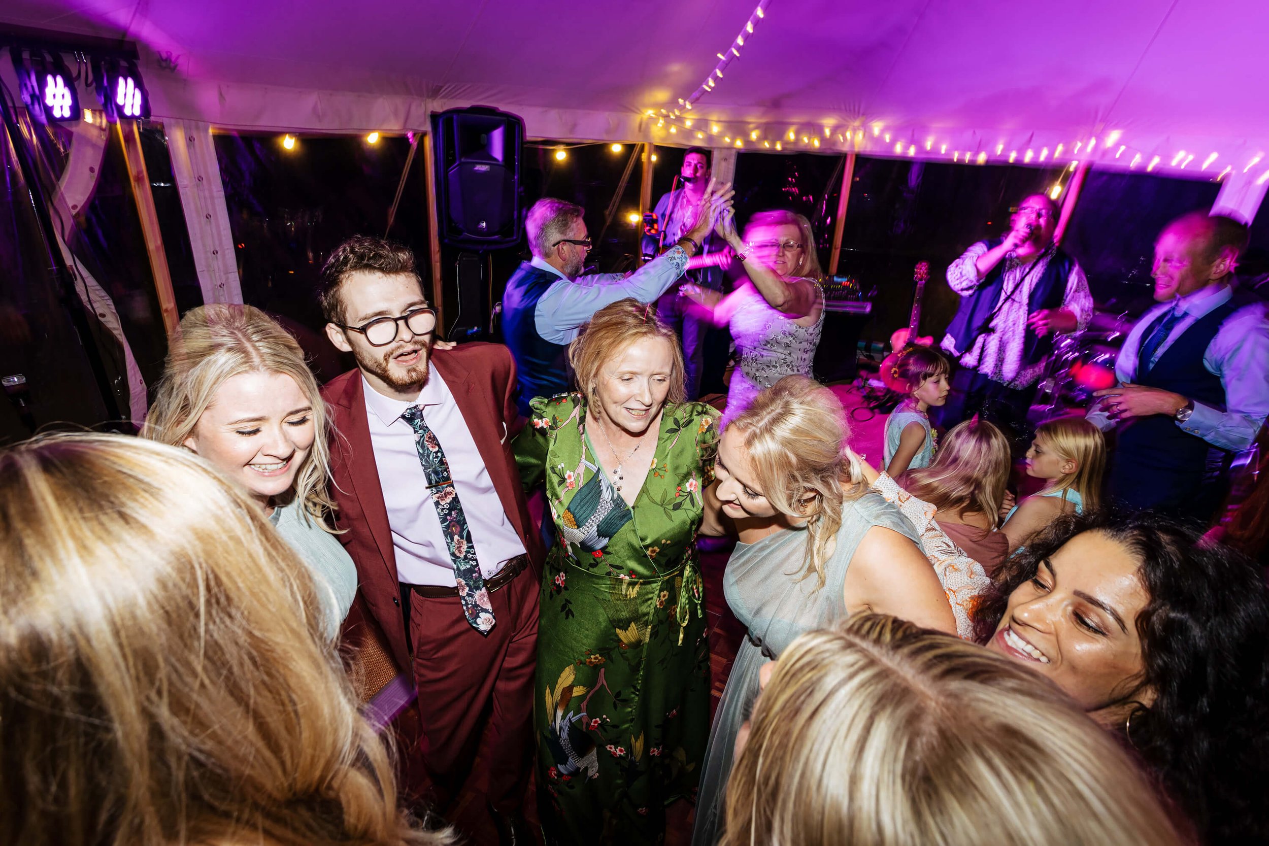 Wedding guests dancing at Kilnsey Park