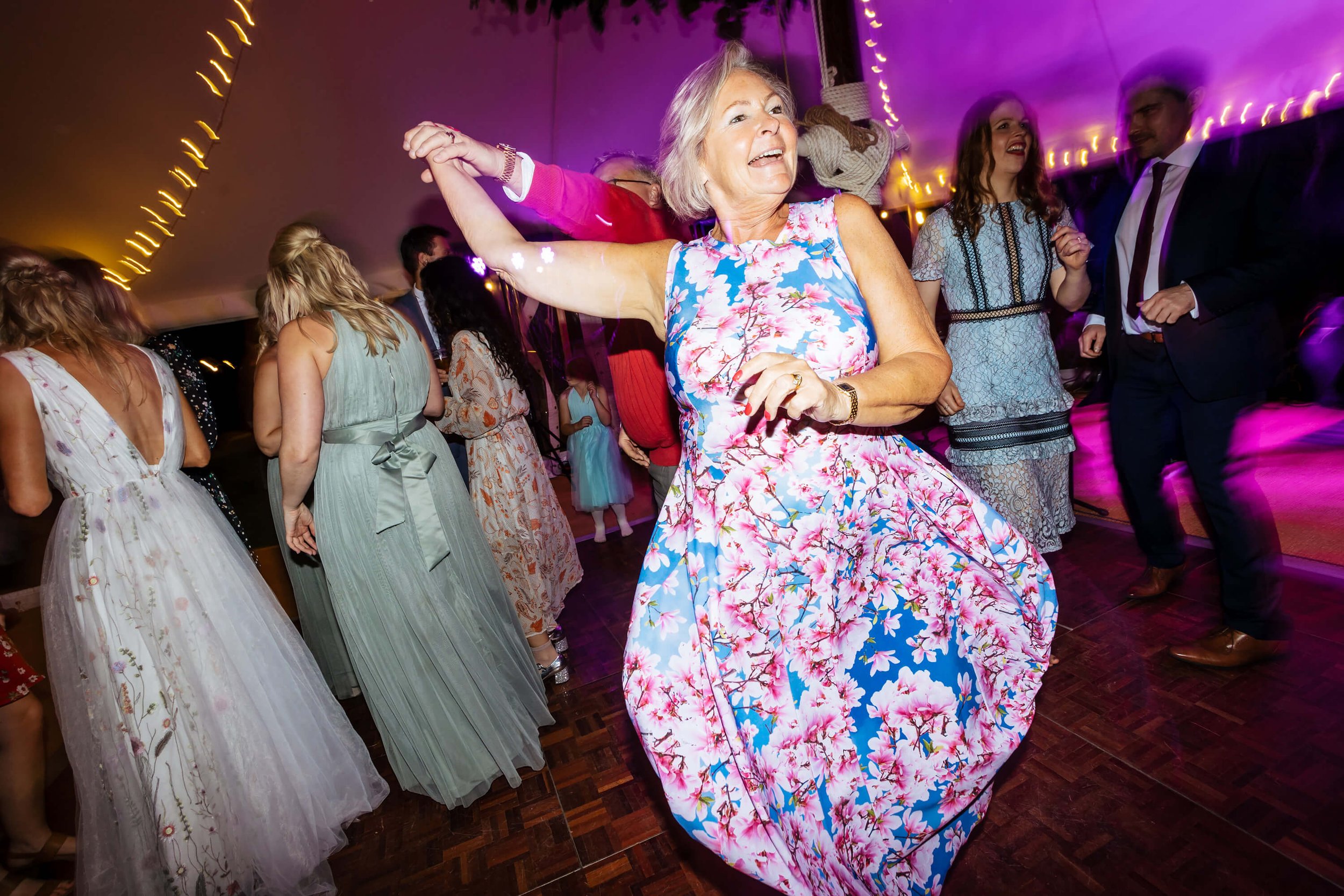 Fun dance floor action at a Kilnsey Park wedding