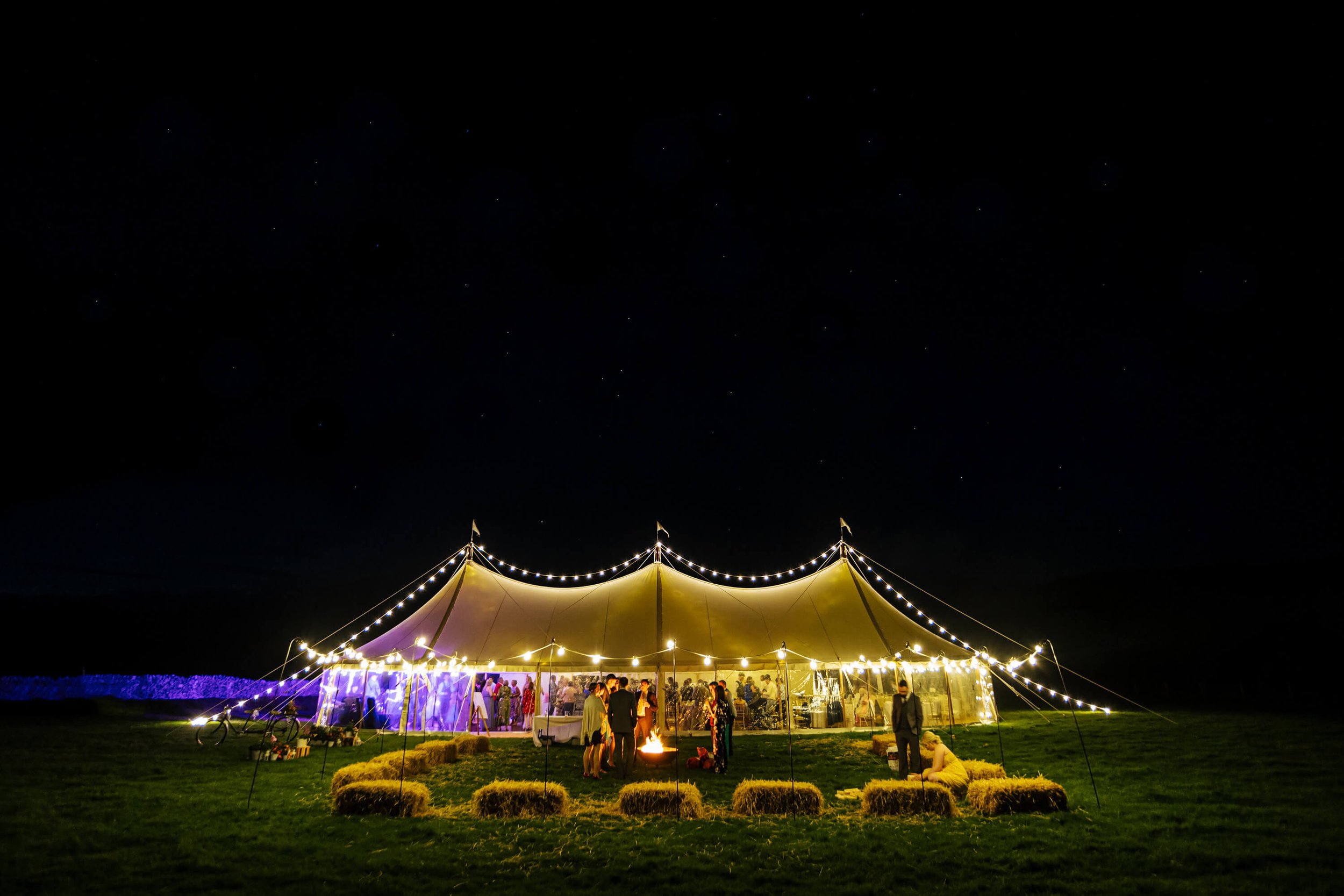 Evening shot of the marquee at a Kilnsey Park wedding