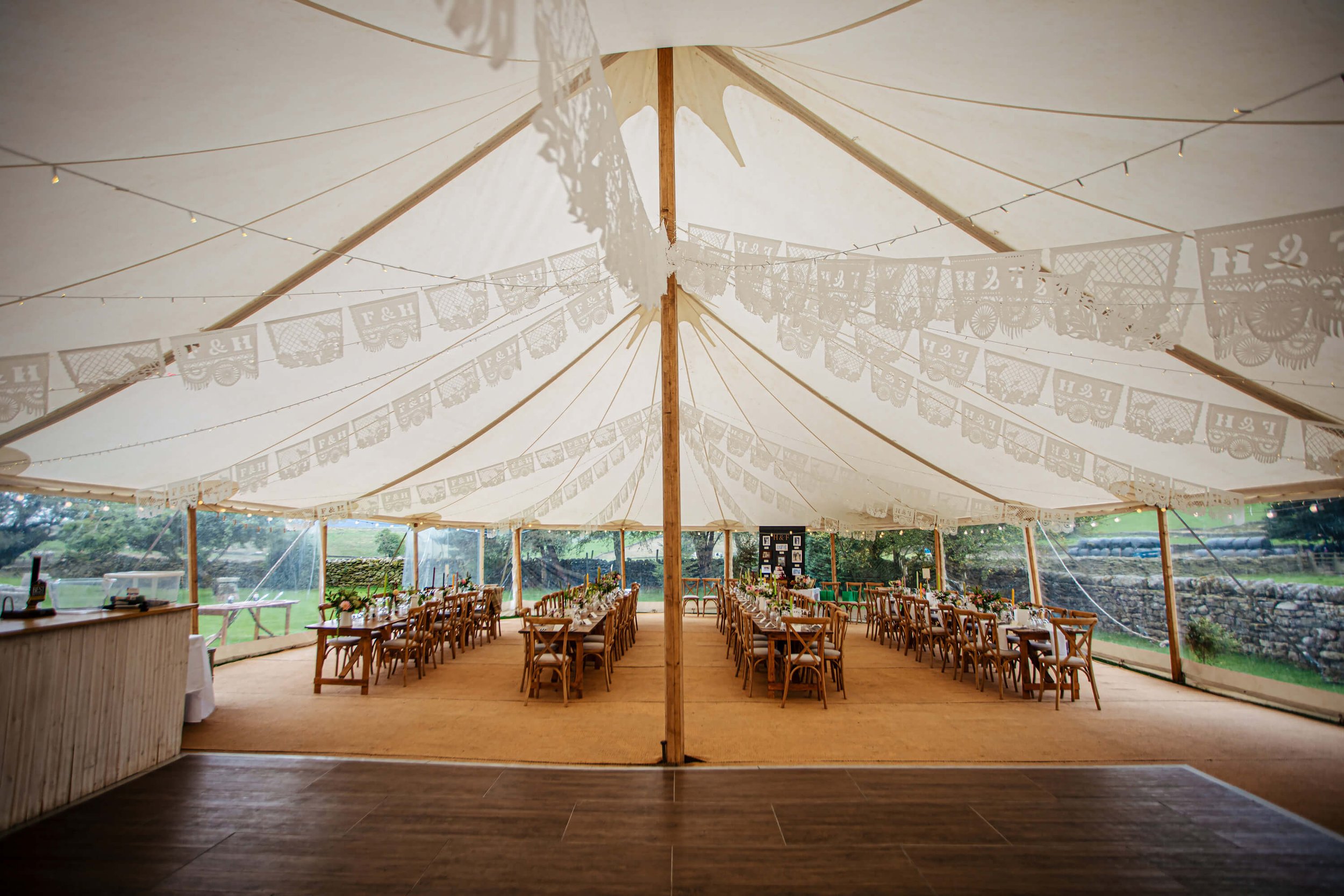 A wedding marquee set up before the guests arrive in Burnsall