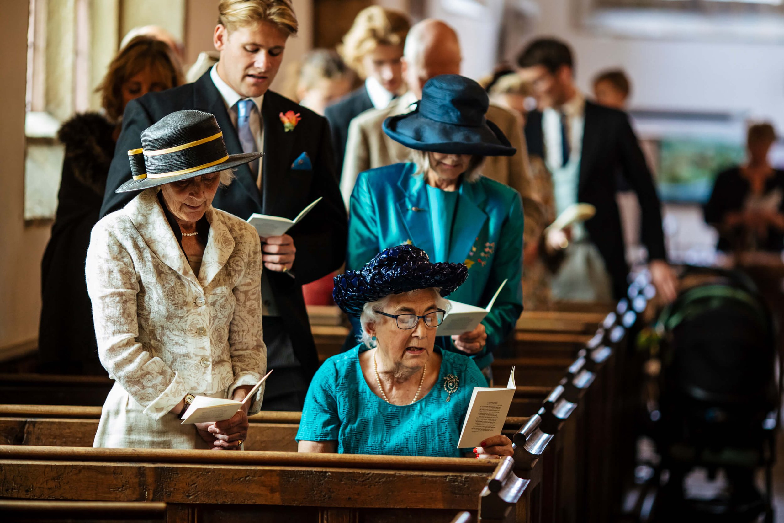 Wedding guests singing hymns in Burnsall