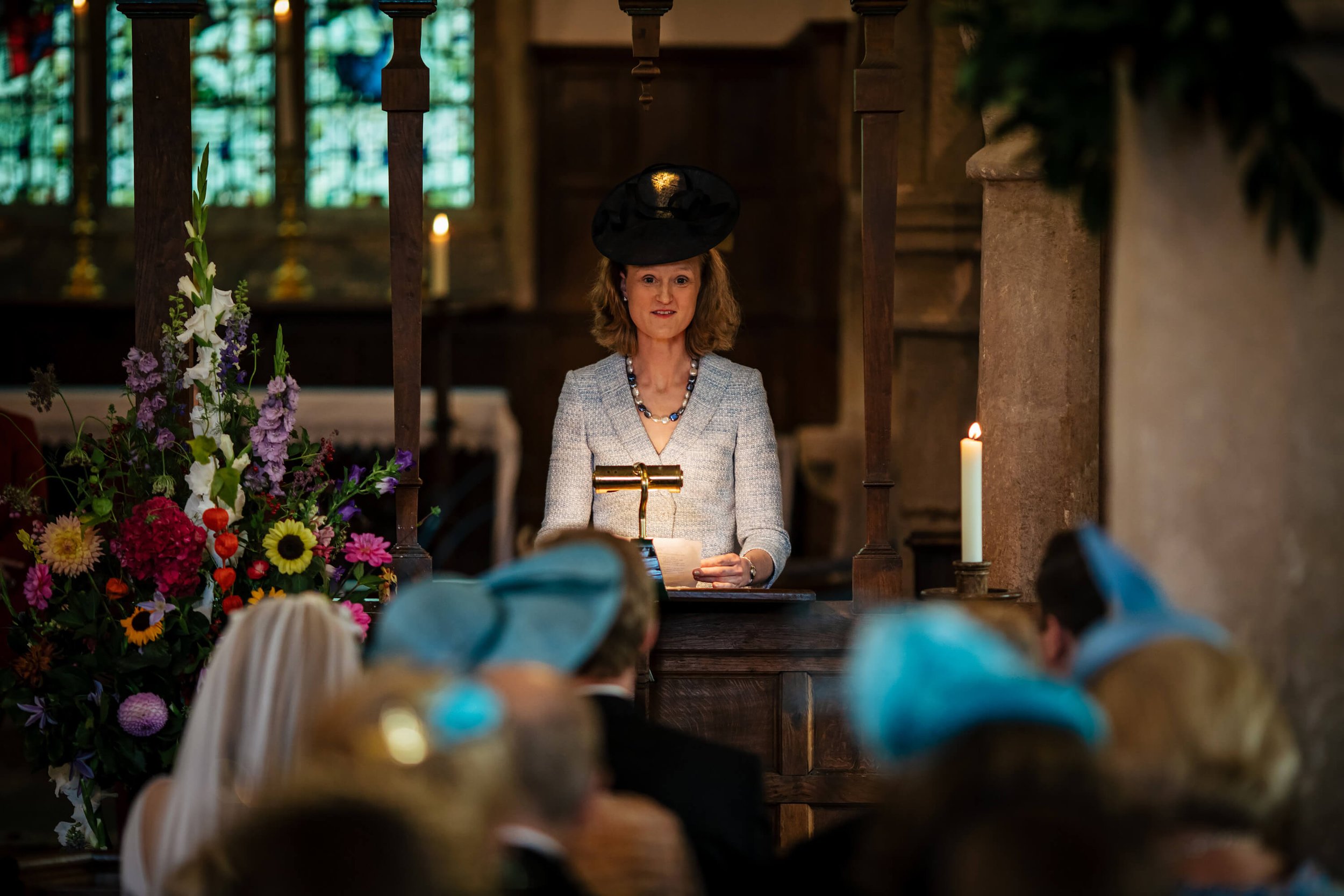 Mother of the bride performs a reading during the wedding ceremony