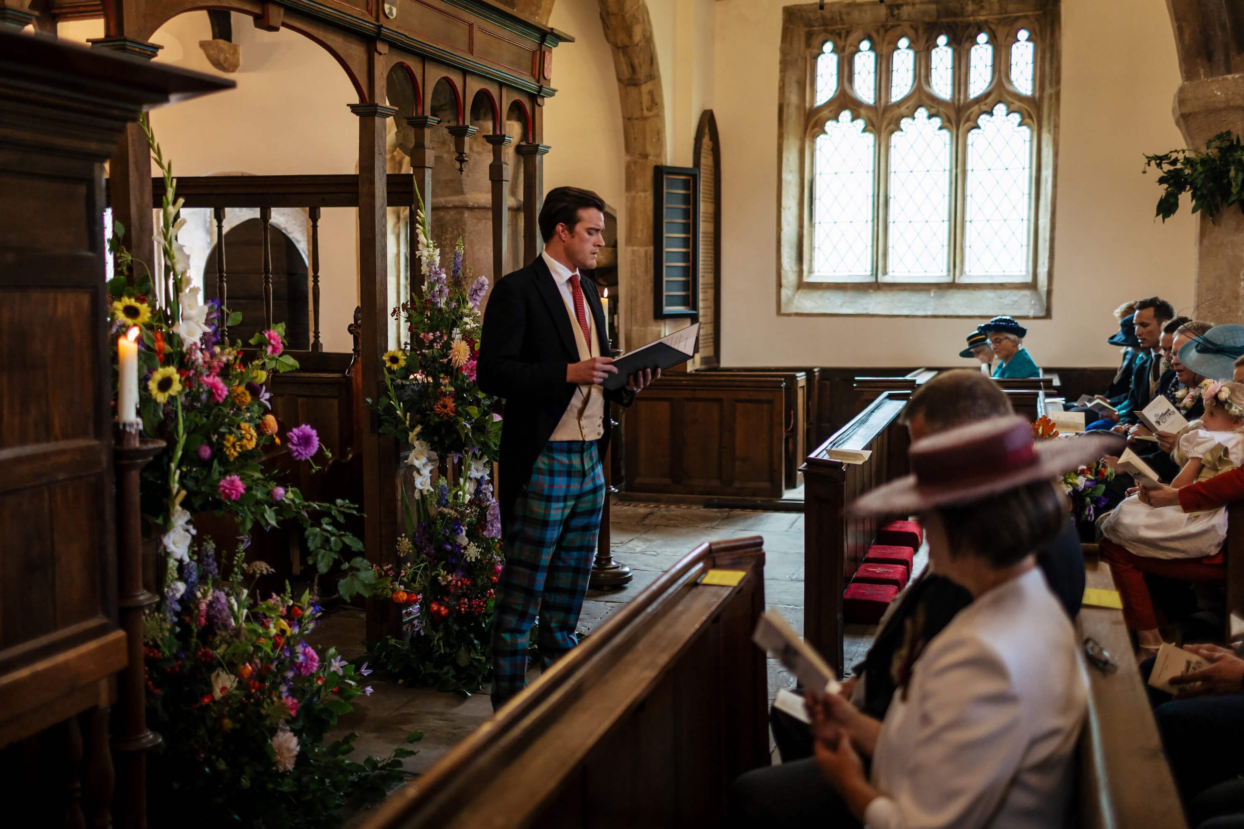Wedding guest performing a solo hymn at the ceremony