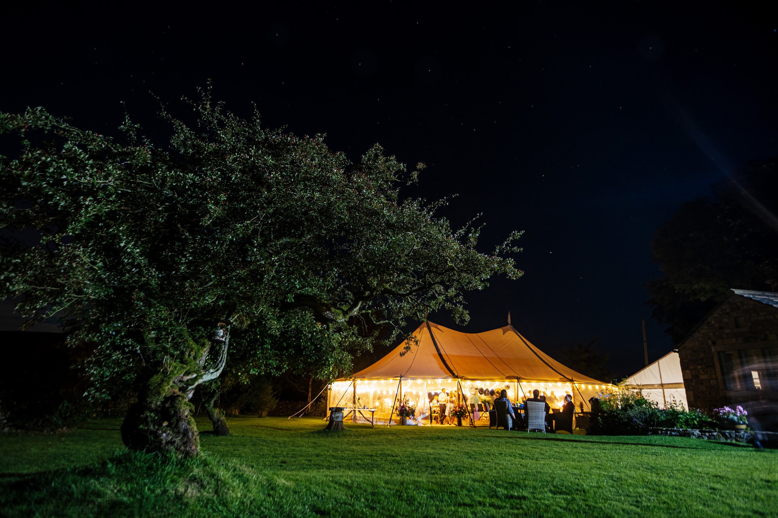 Night time shot of the marquee at a Burnsall wedding
