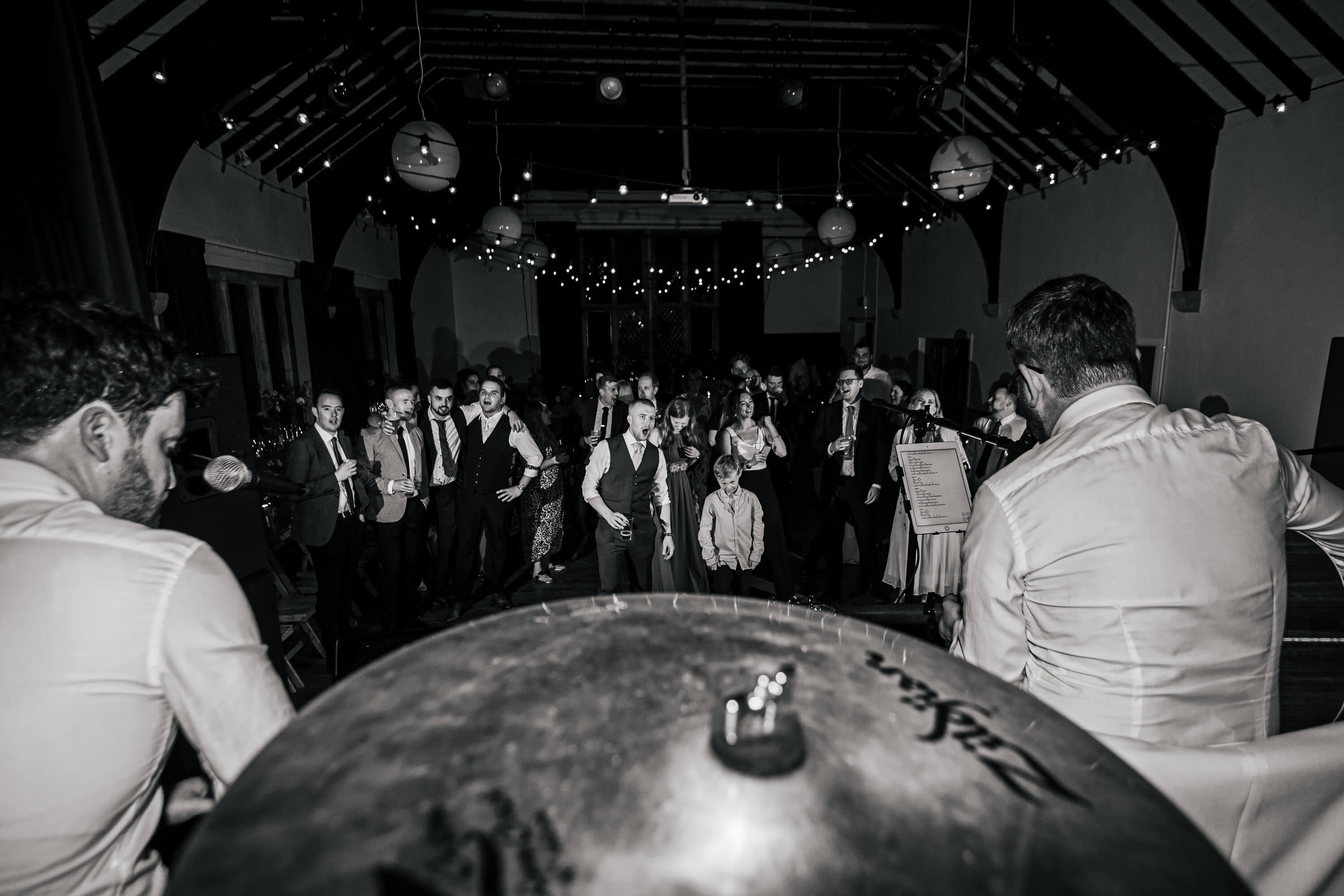 Live band performing at a Burnsall Village Hall wedding