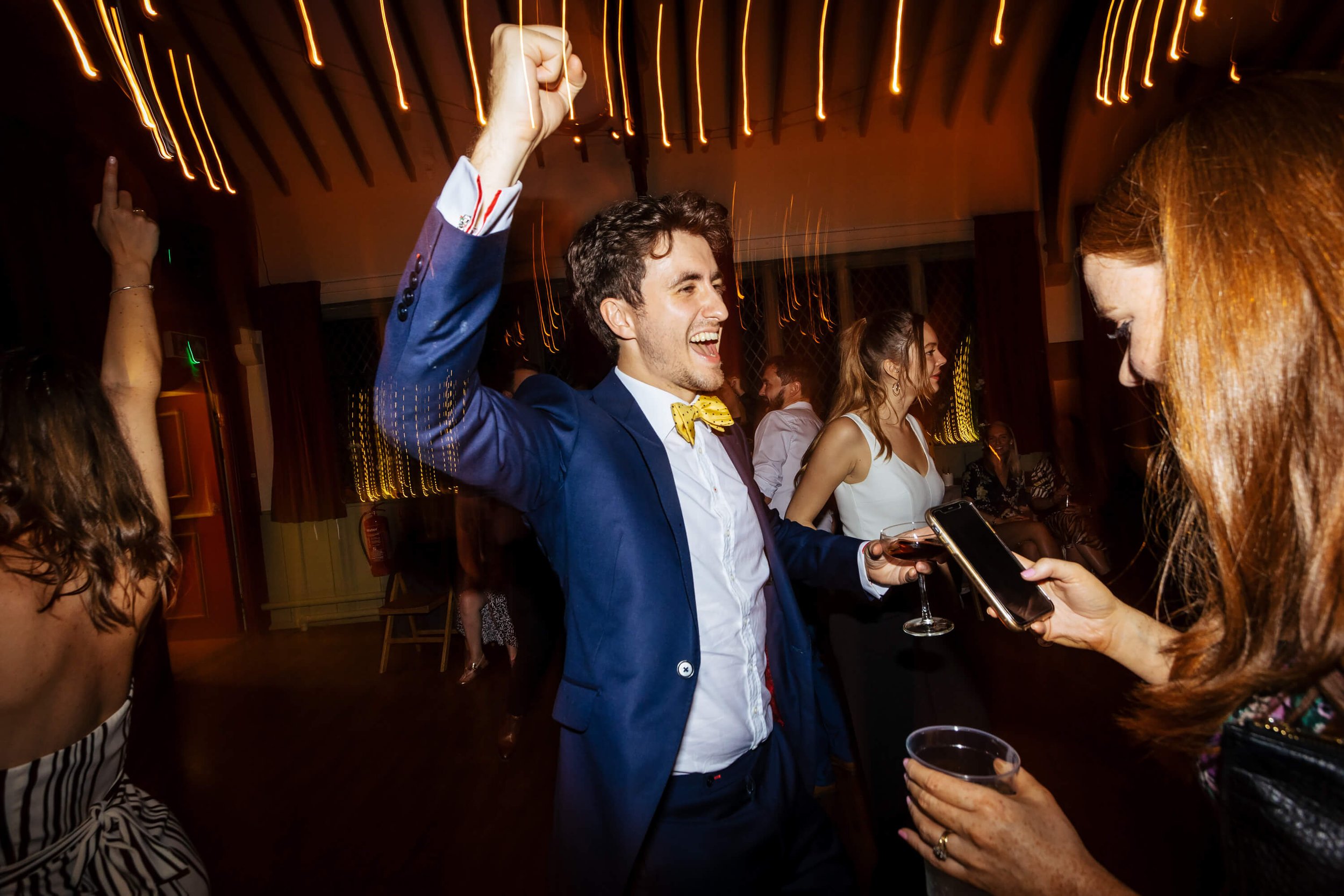 Man on the dance floor at a wedding at Burnsall Village Hall