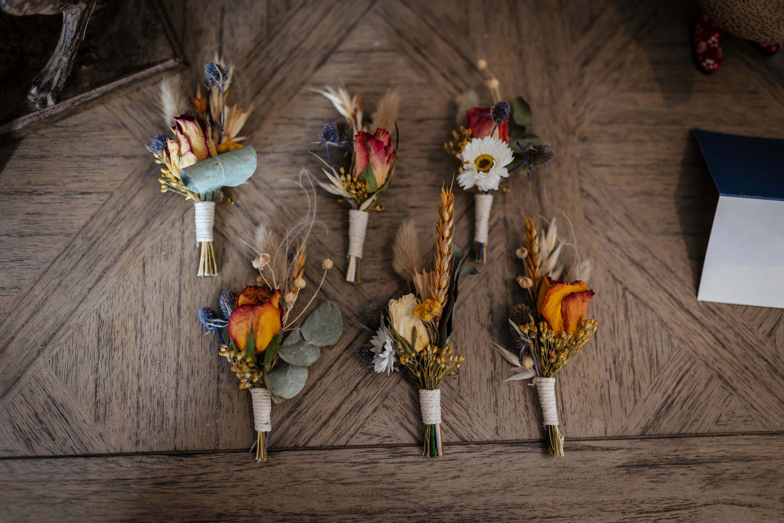 Beautiful wedding buttonholes ready to be put on