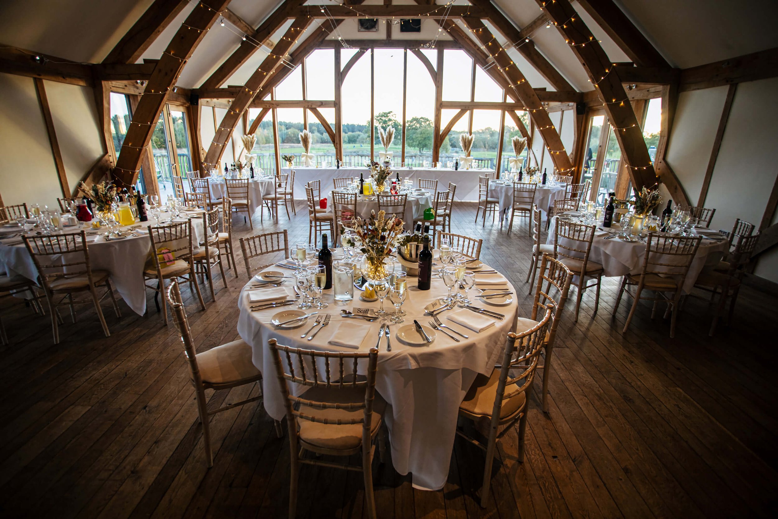 Tables set up ready for a wedding meal at Sandburn Hall