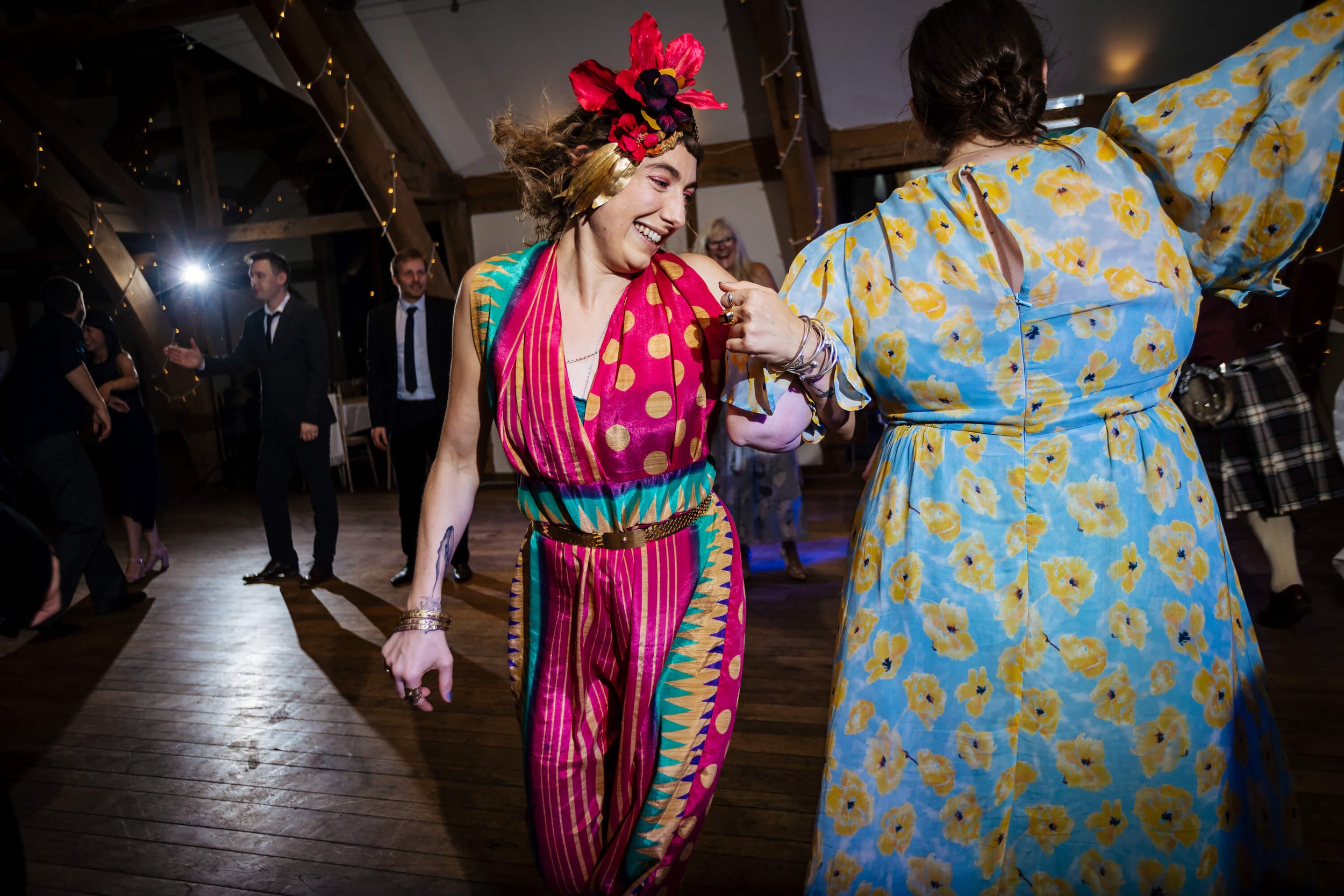 Wedding guests having fun on the dance floor