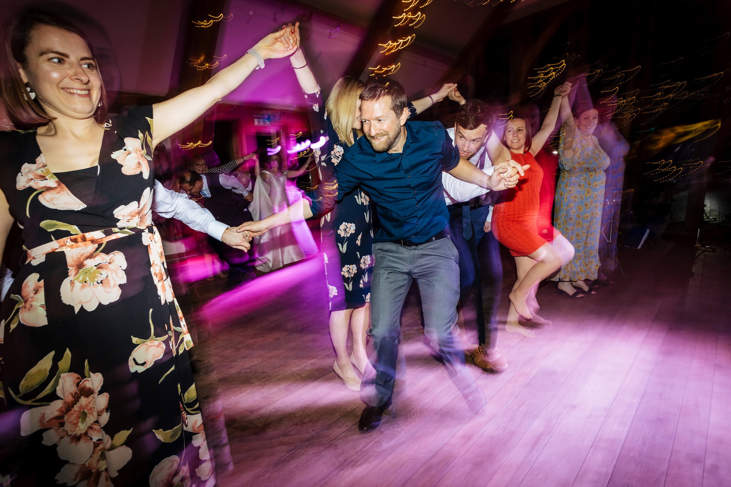 Ceilidh dancing at a Sandburn Hall wedding