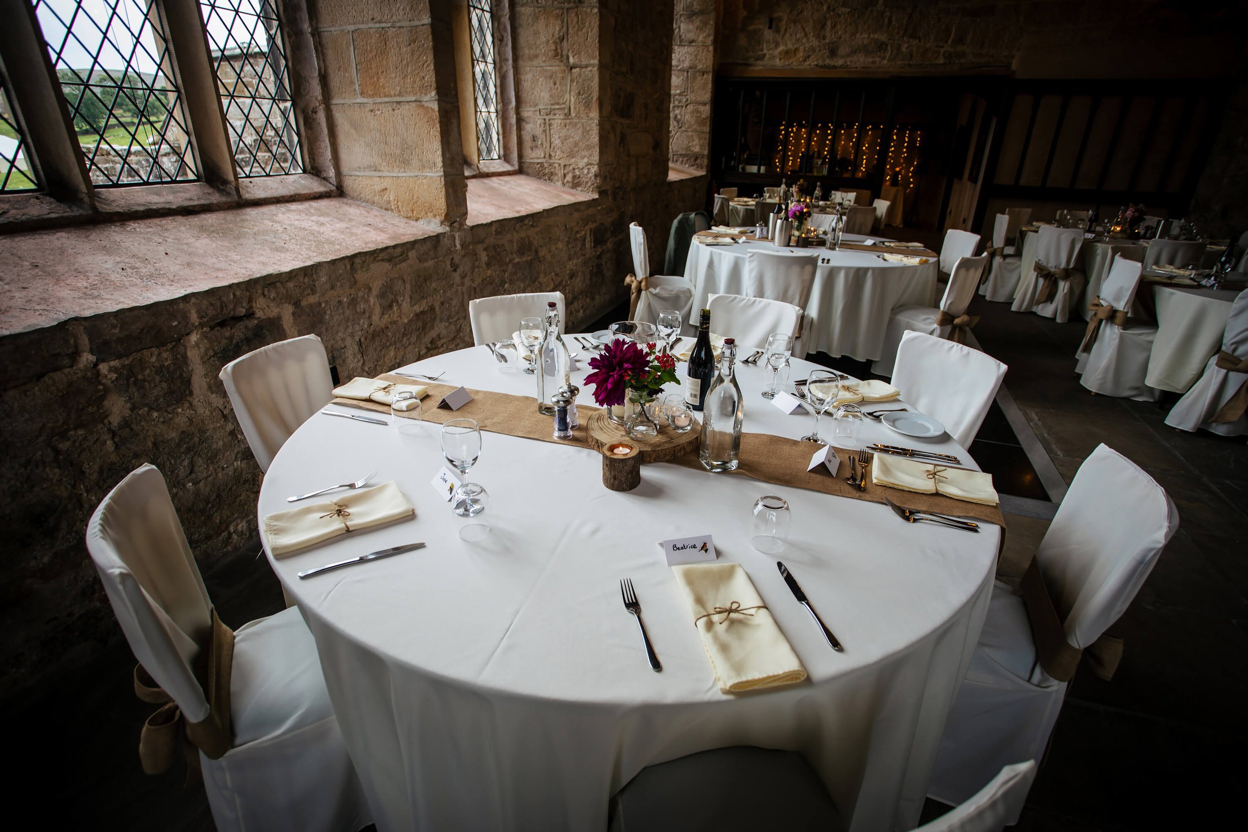 Tables set up for the wedding reception at Barden Tower
