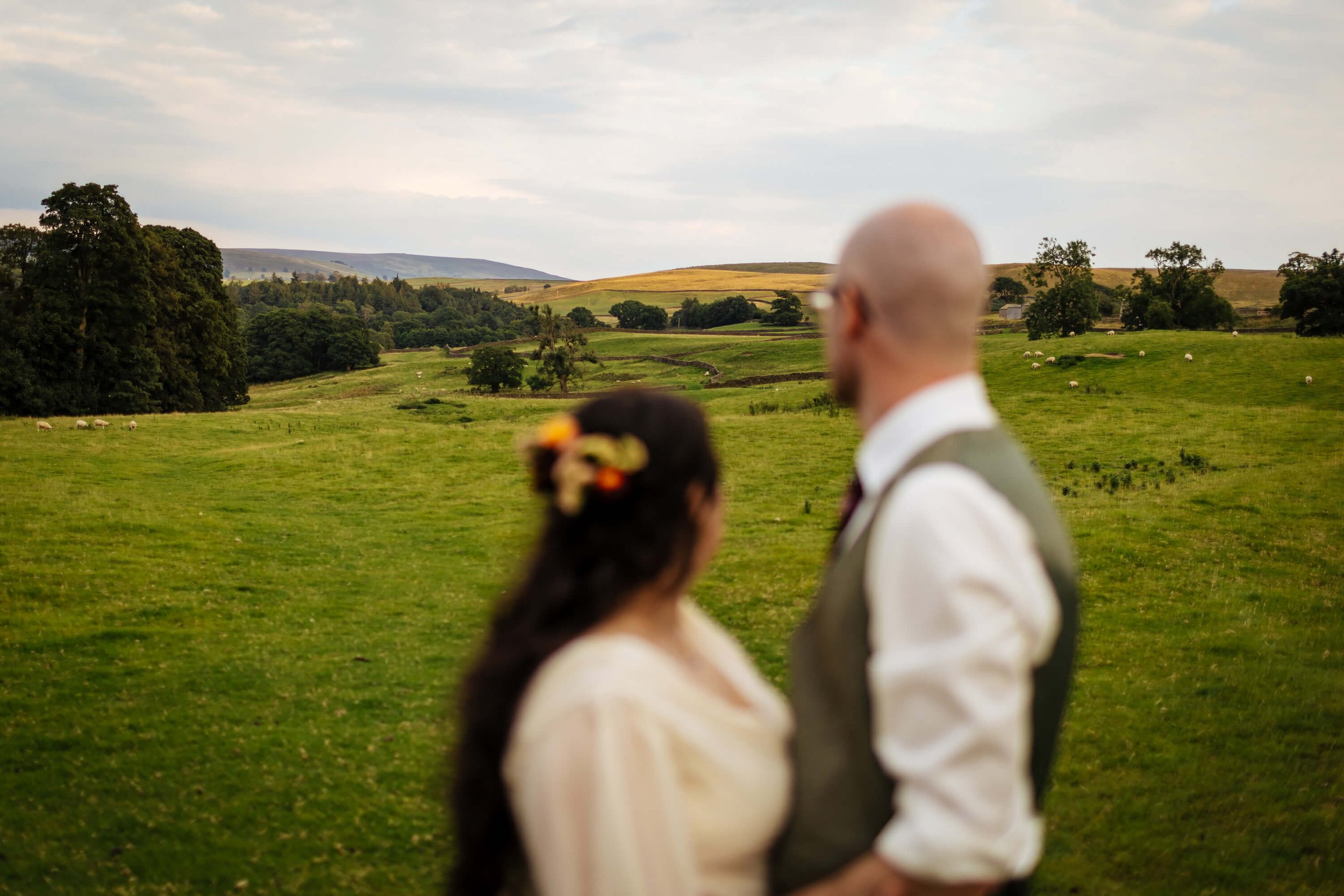 Bride and groom enjoying the scenery at their Yorkshire wedding