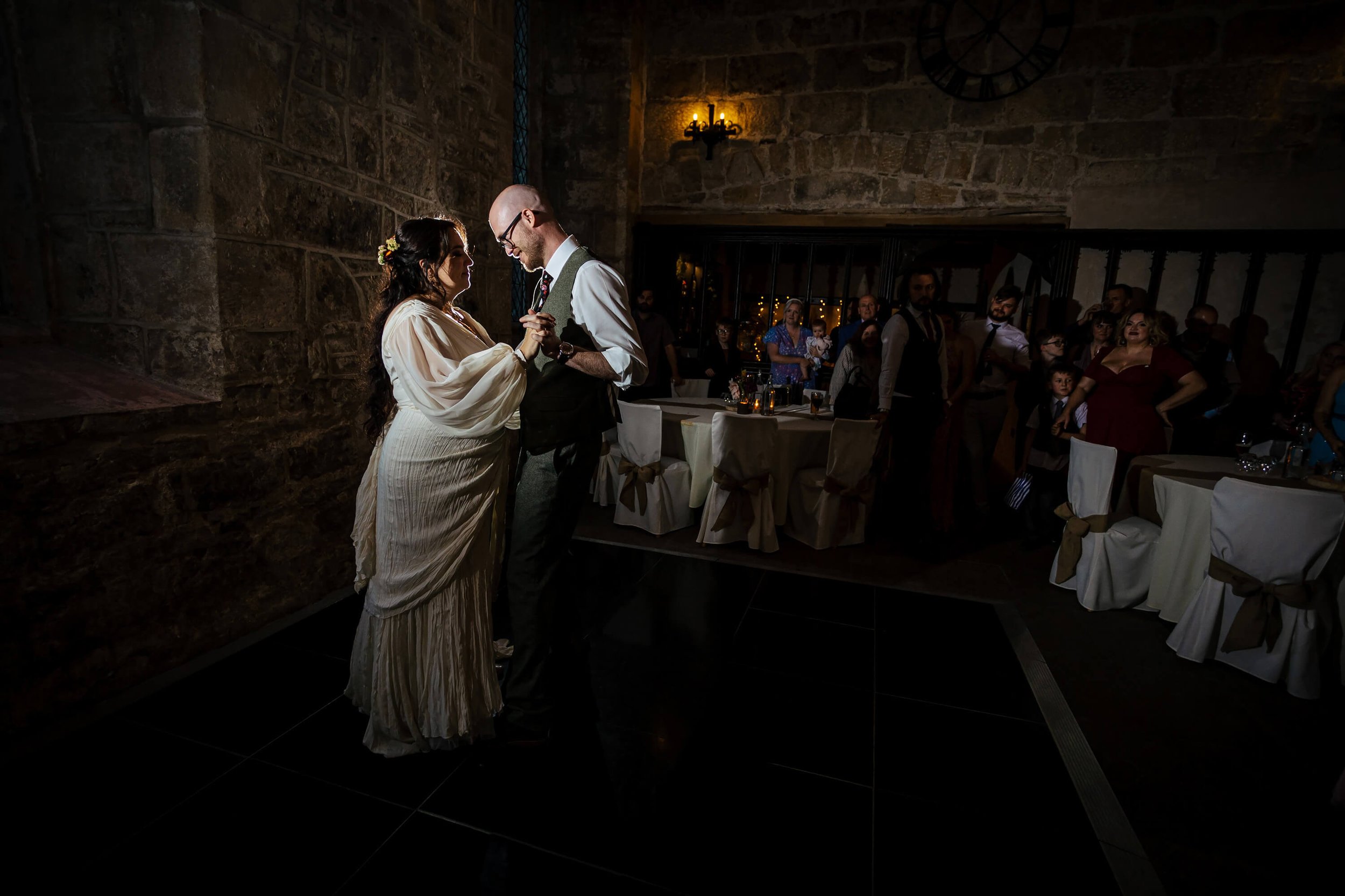 Bride and groom performing their first dance as a married couple