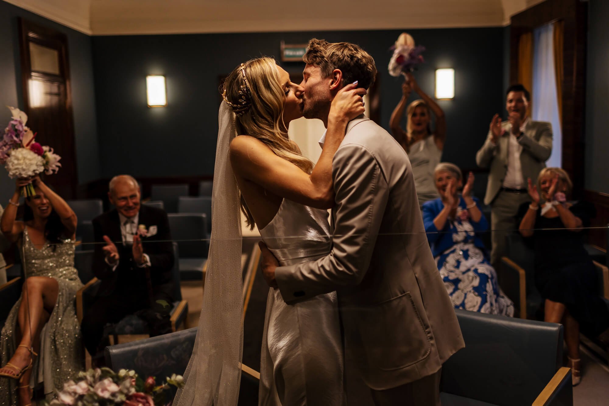 A first kiss at a wedding ceremony in London