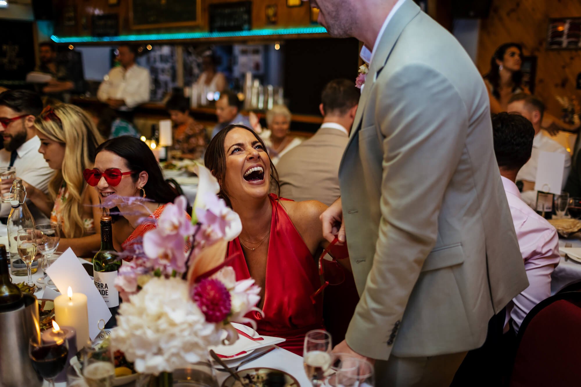 Guests laughing at a wedding at MOTH Club