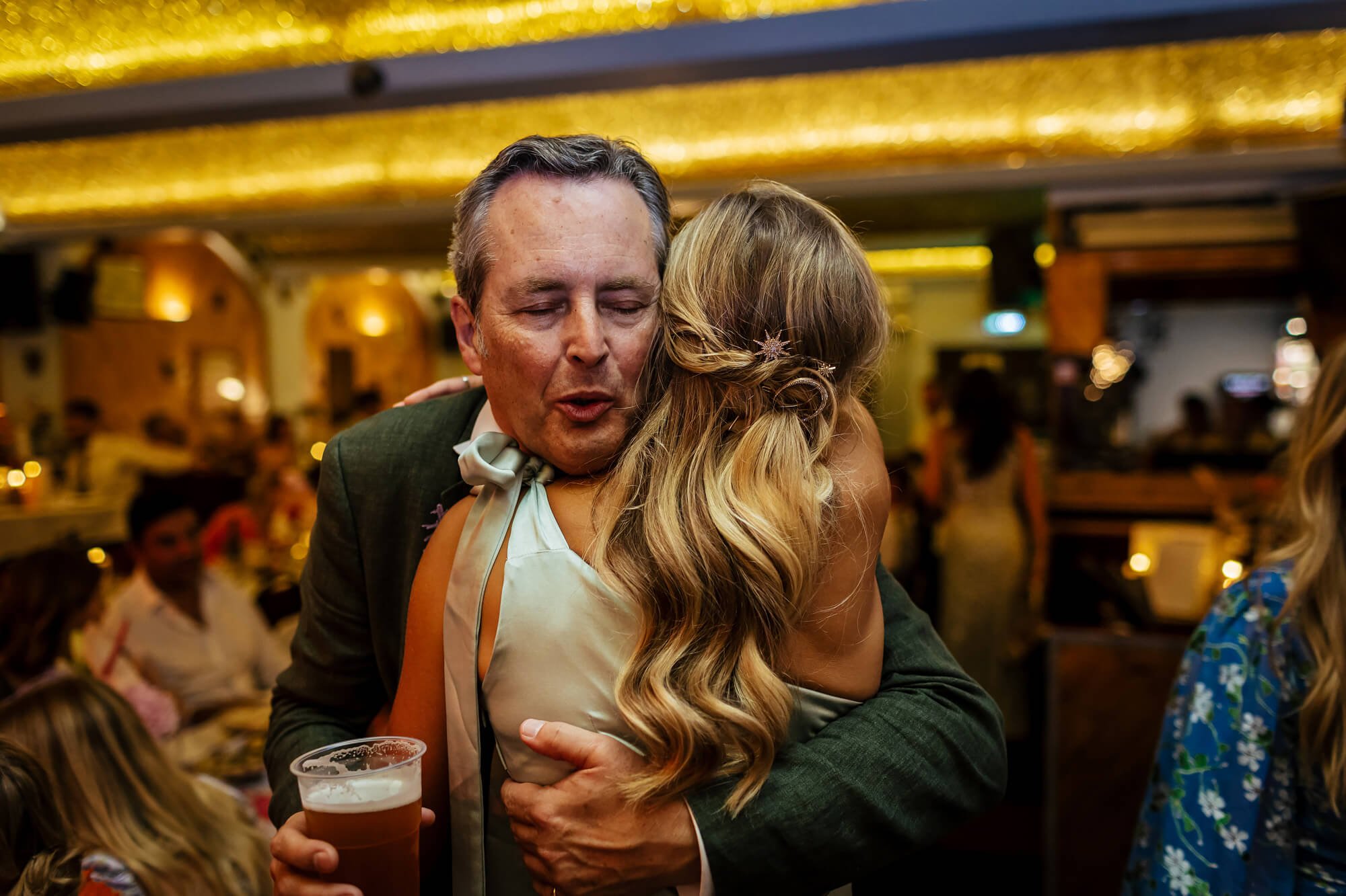 Hugging a at wedding at MOTH Club in London