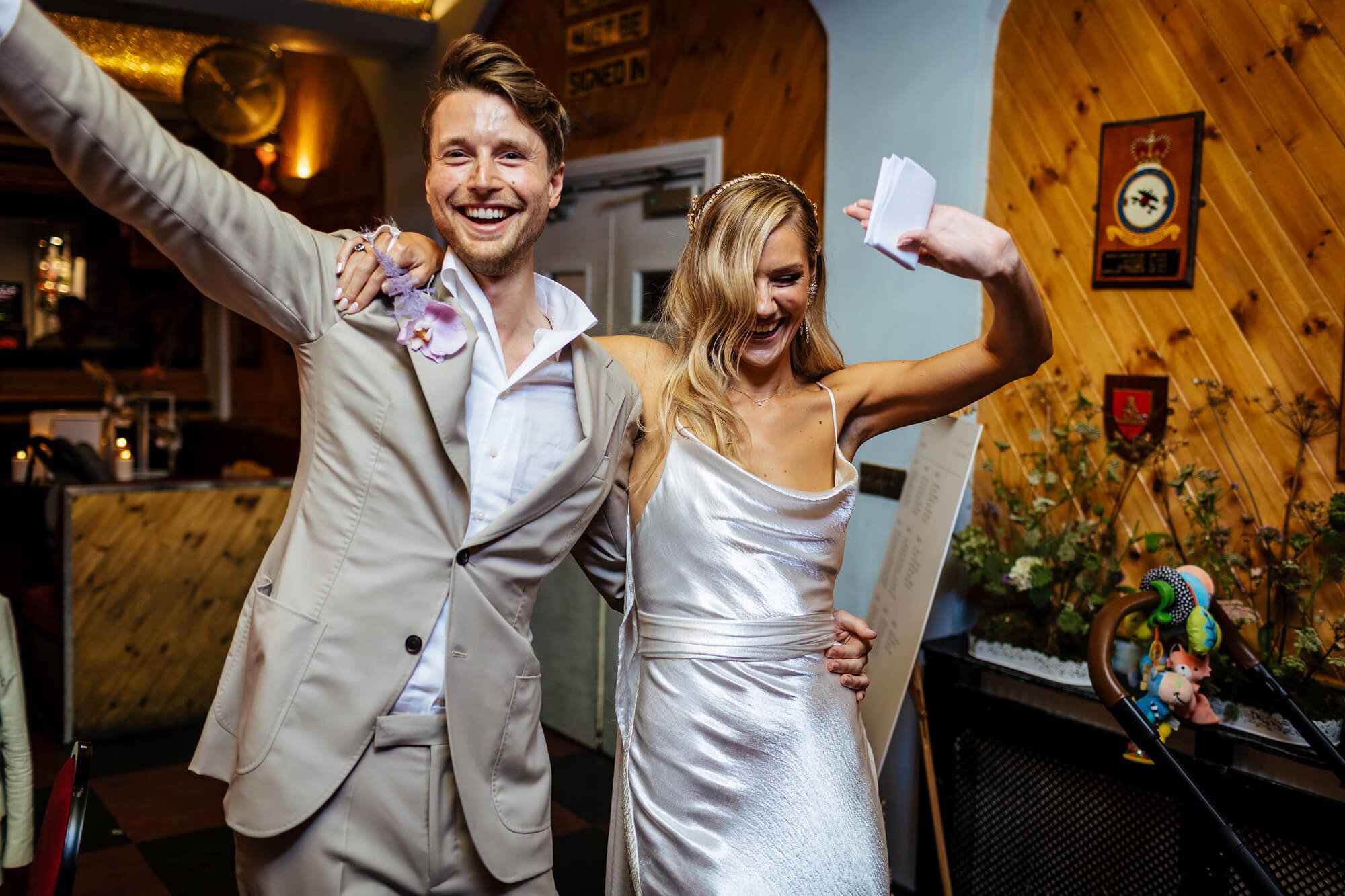 Bride and groom enter the venue at their wedding reception