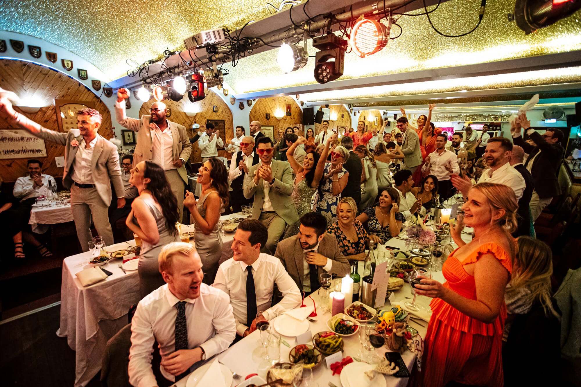 Wedding guests cheering during the speeches in London