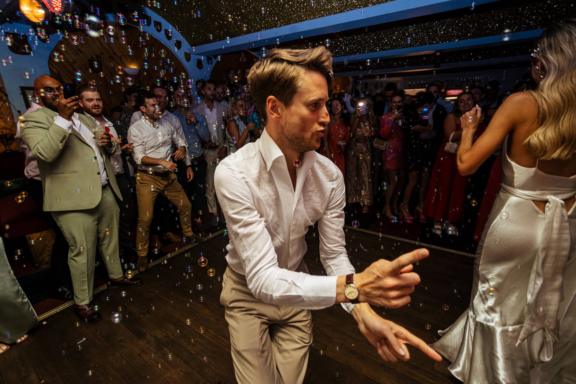 Dancing at a wedding reception in the evening