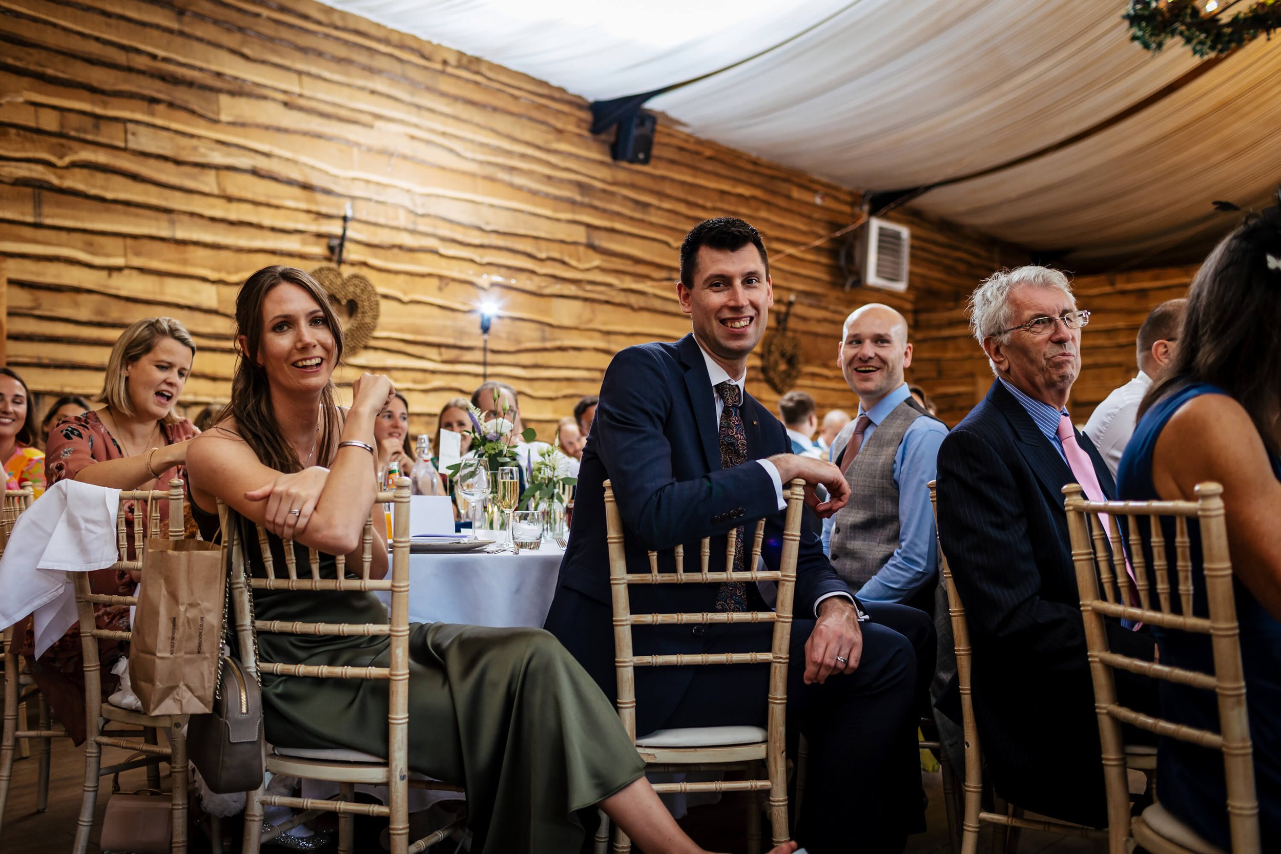 Guests laughing at the wedding speeches in Yorkshire