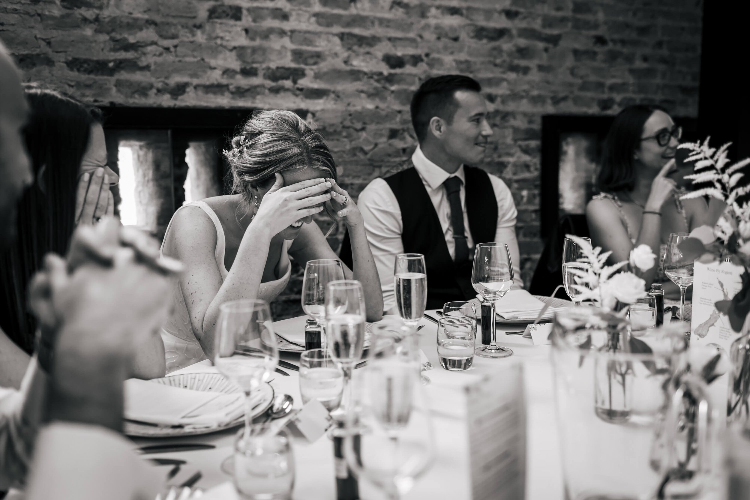 Bride embarrassed during the speeches