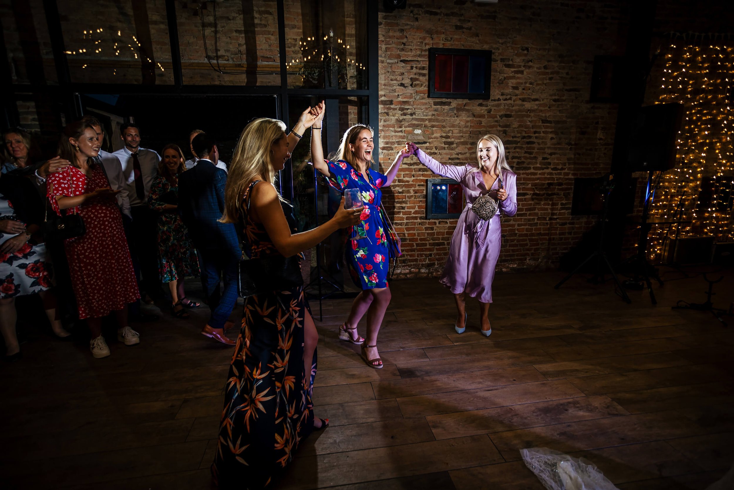 Guests laughing on the dance floor in Yorkshire