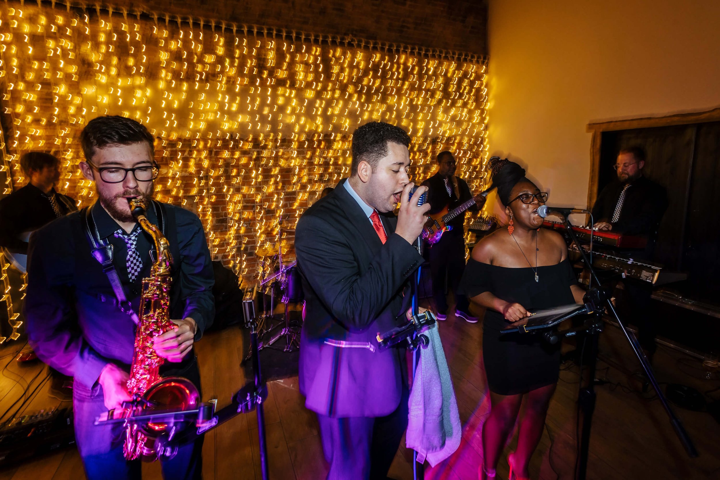 Wedding band entertaining the guests on the dance floor