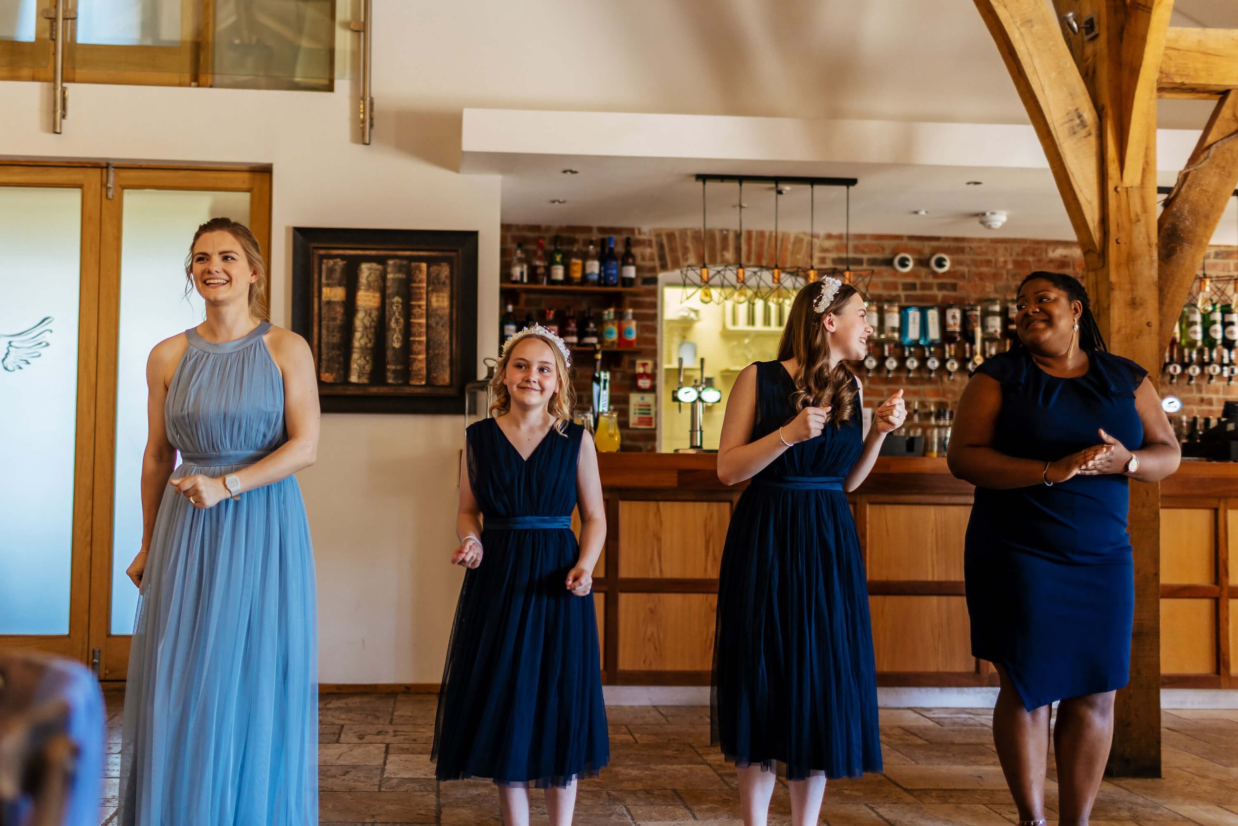 A flash mob of bridesmaid singers at a wedding