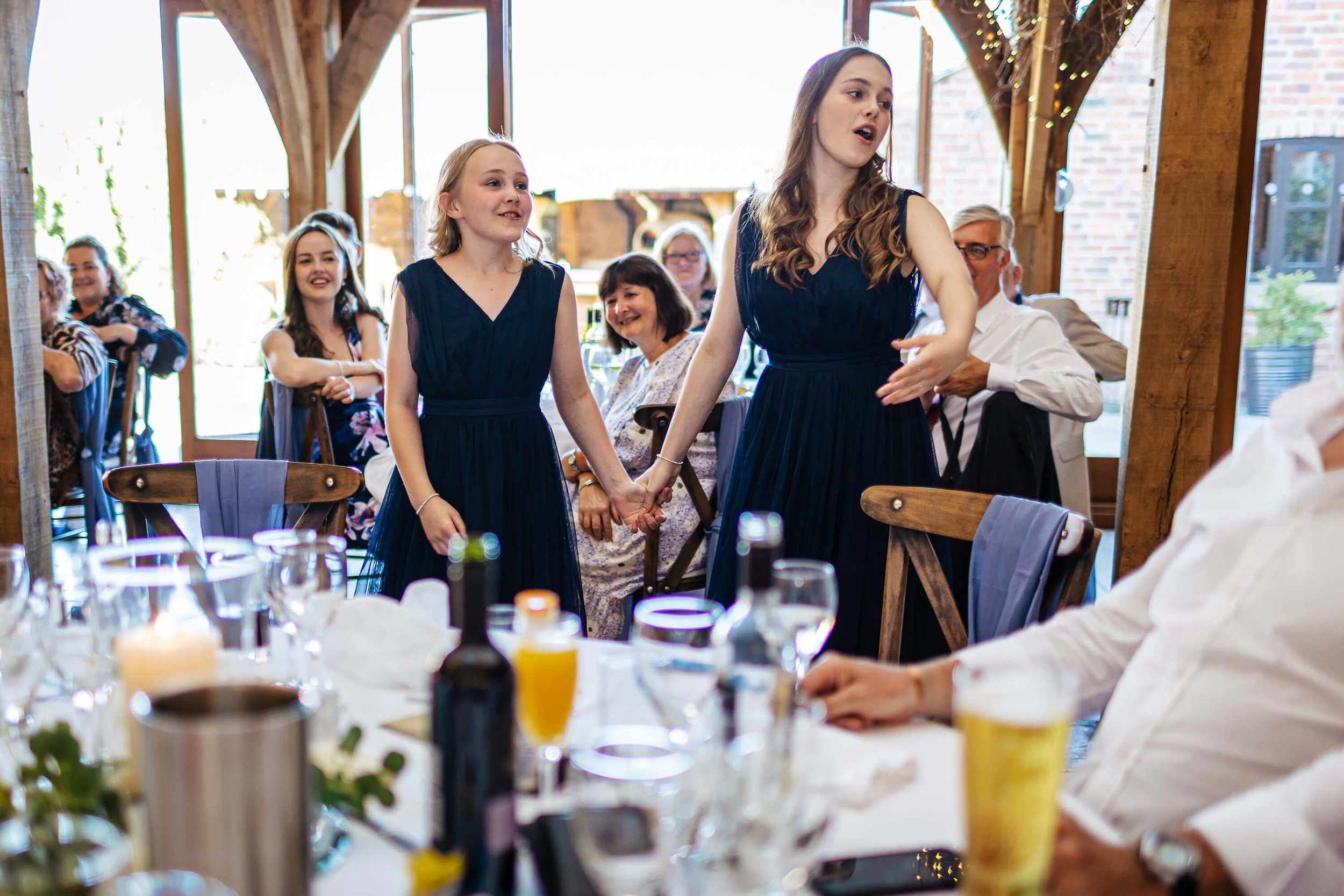 Young girls singing at a wedding breakfast