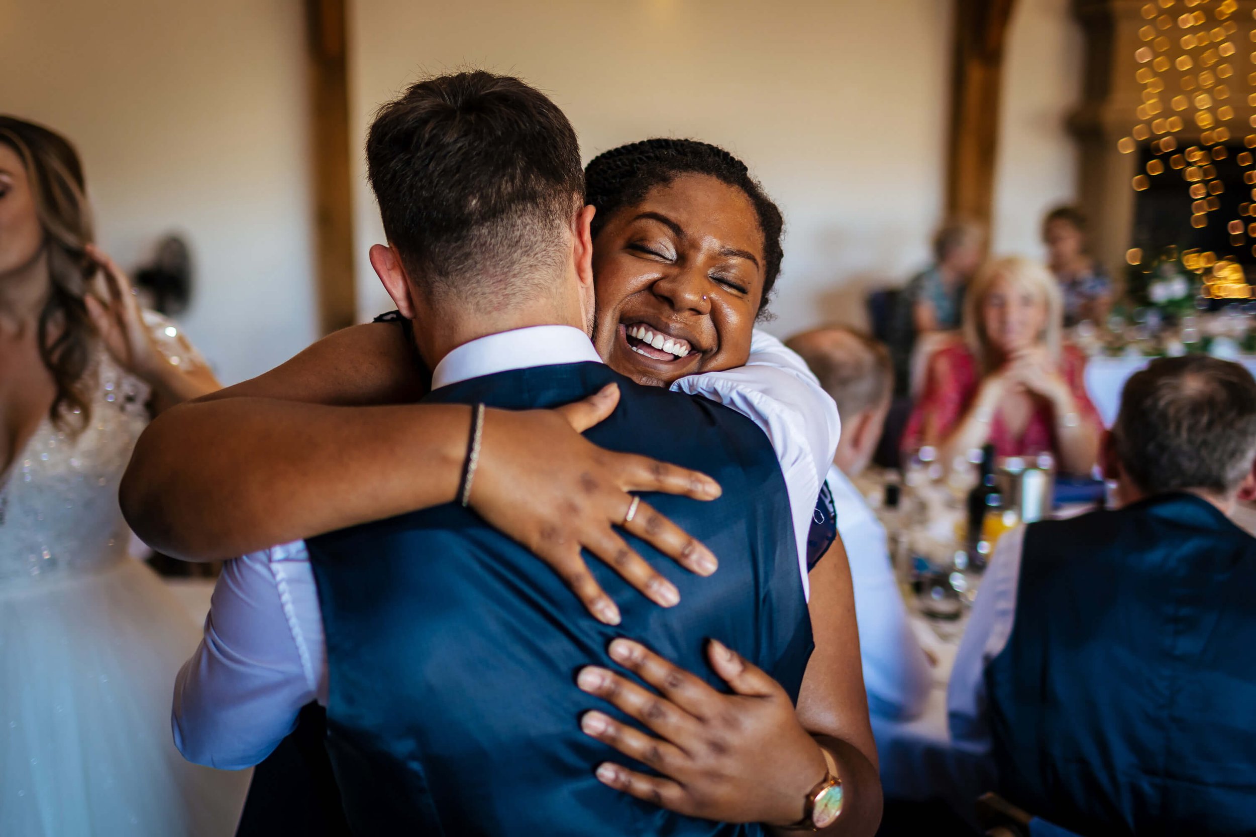 Guests hugging at a wedding in Nottinghamshire