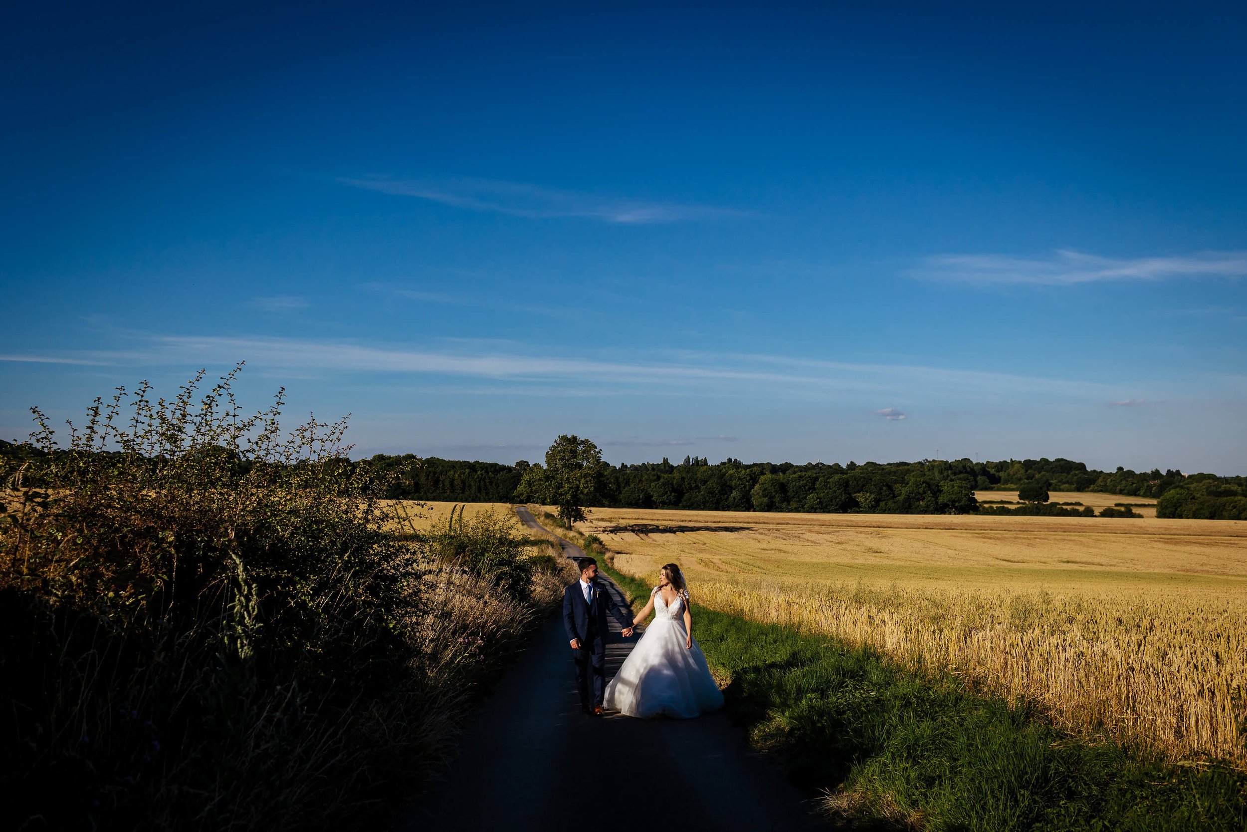Bride and groom in the sunshine at a Swancar Farm wedding