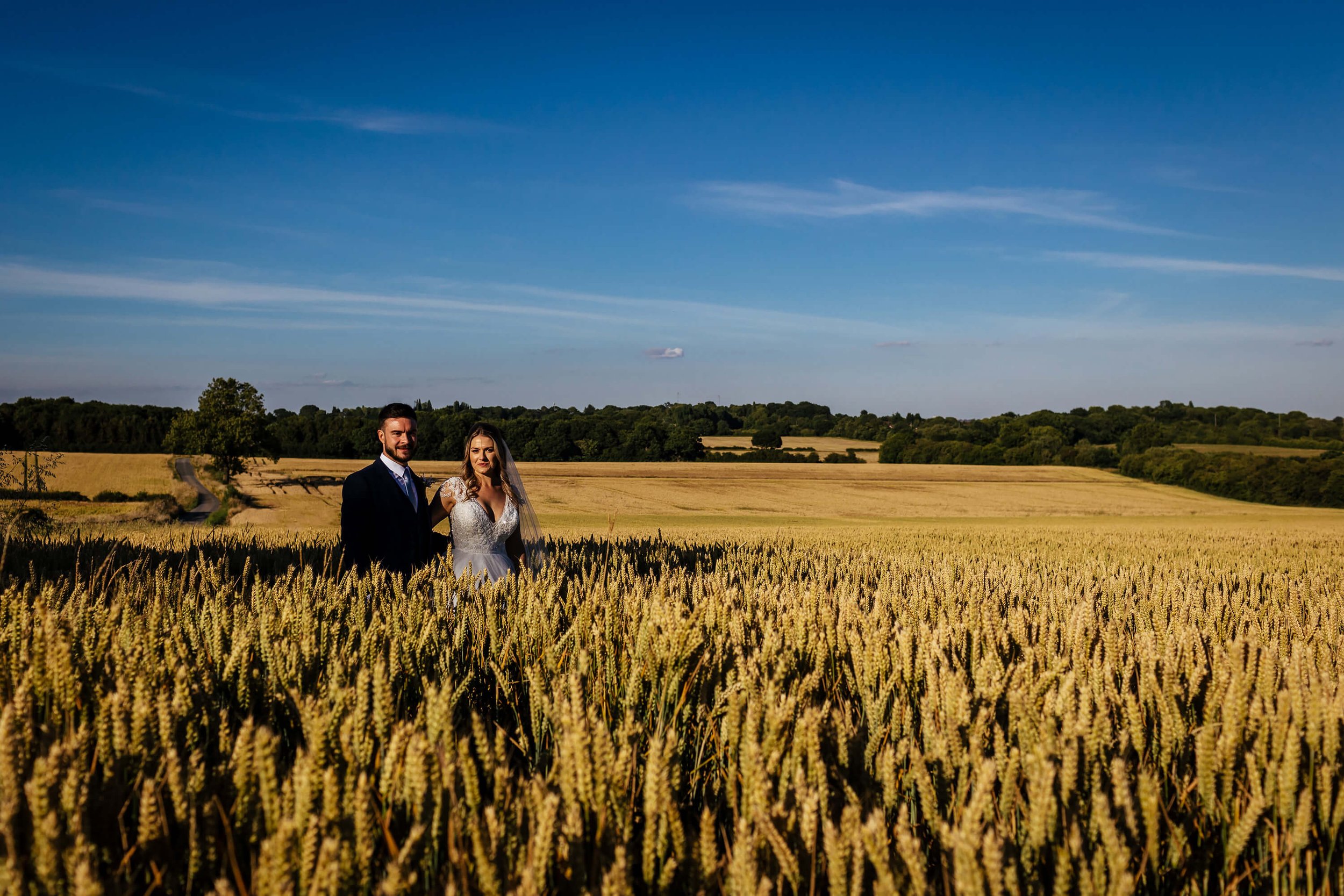 Amongst the wheat fields at a wedding in Nottinghamshire
