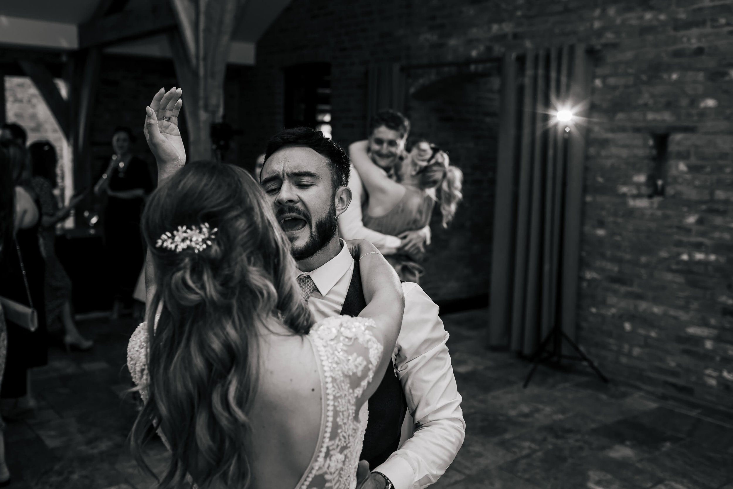 Newlyweds dancing their first dance at the wedding