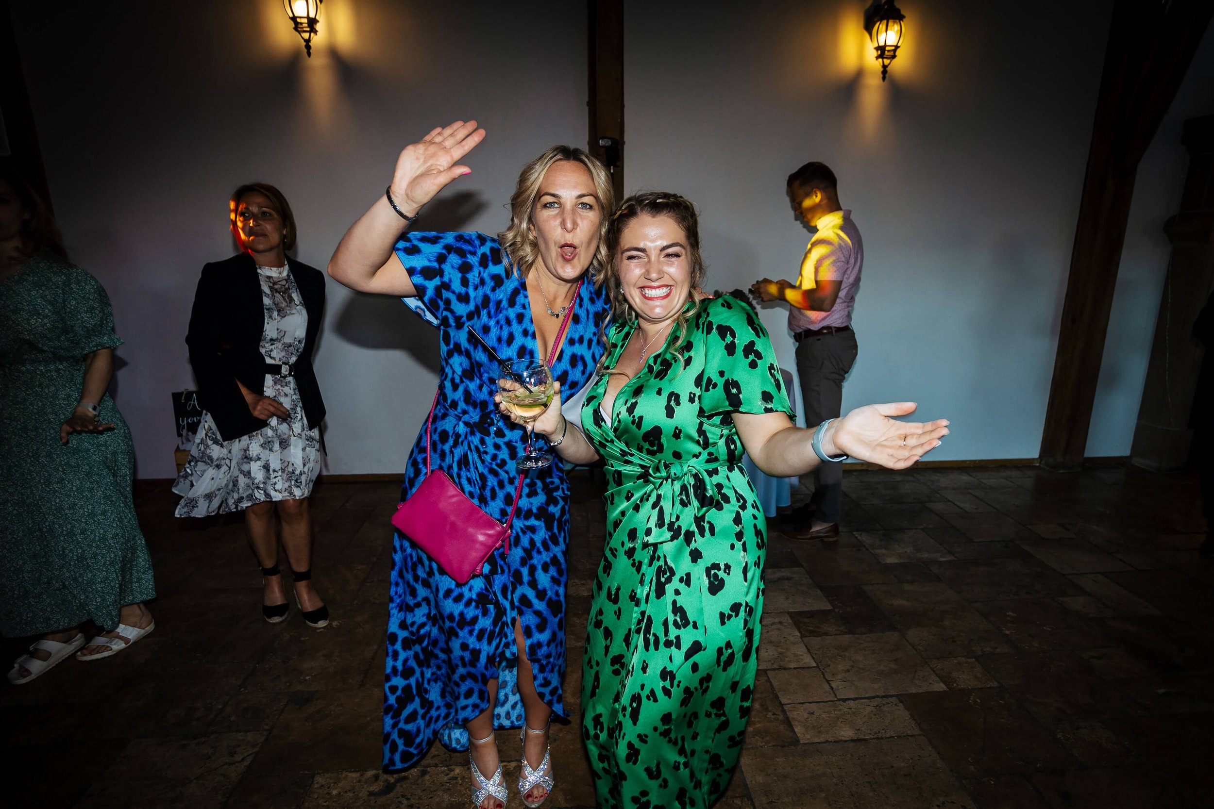 Wedding guests having fun on the dance floor