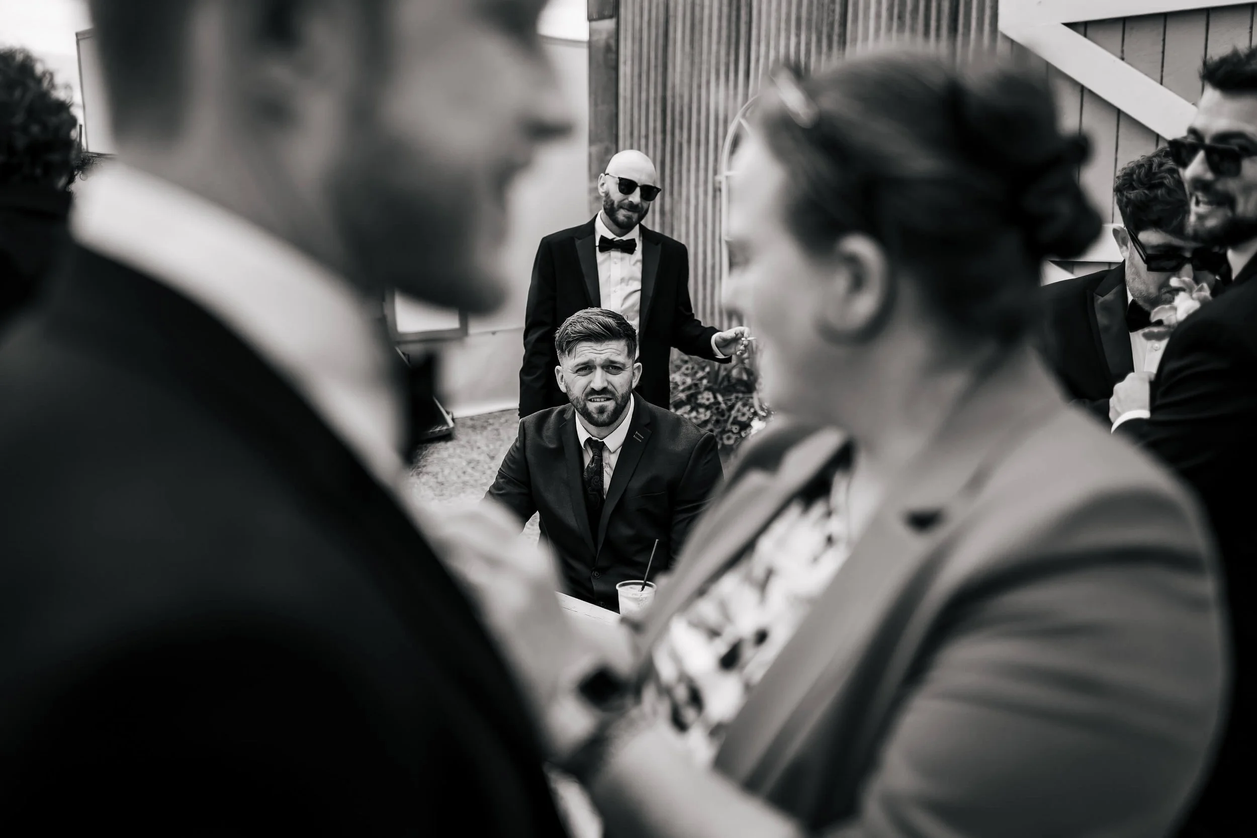 Guests look on in anticipation for a wedding