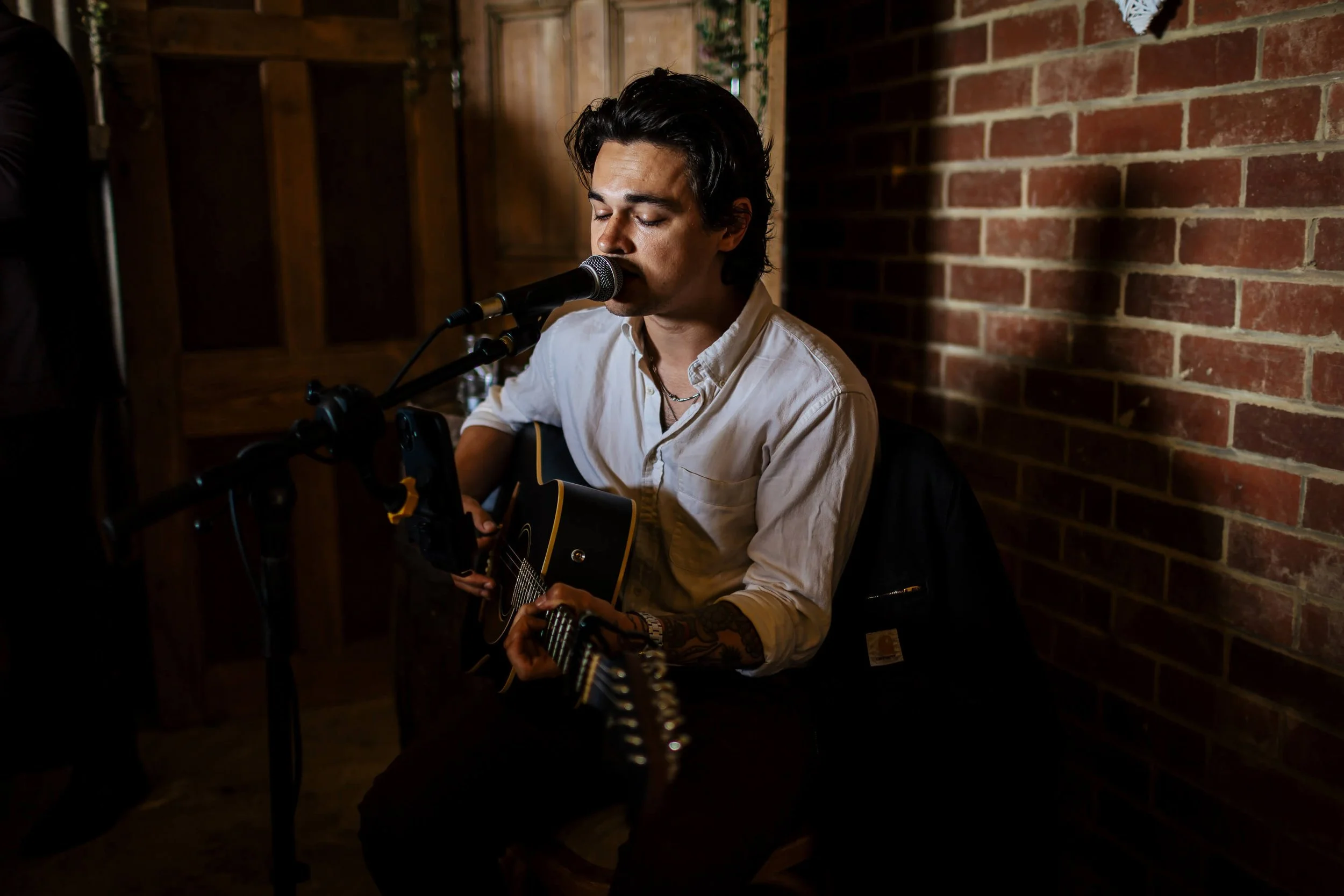 Guitarist performing at a wedding ceremony